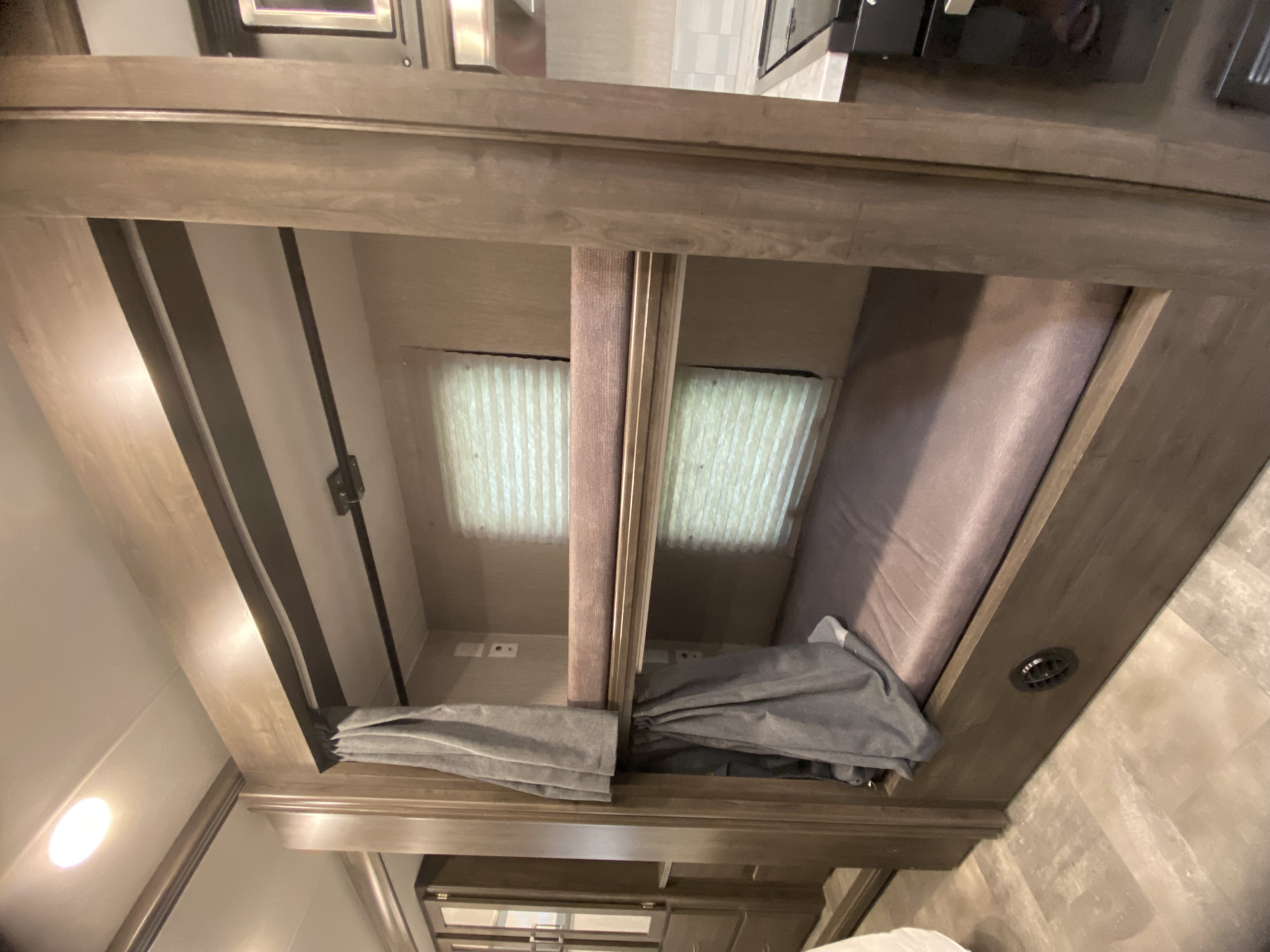 Get a look at the cozy bunk beds in this RV rental, featuring windows with blinds and soft bedding.. Coachman Pursuit BH31 2022