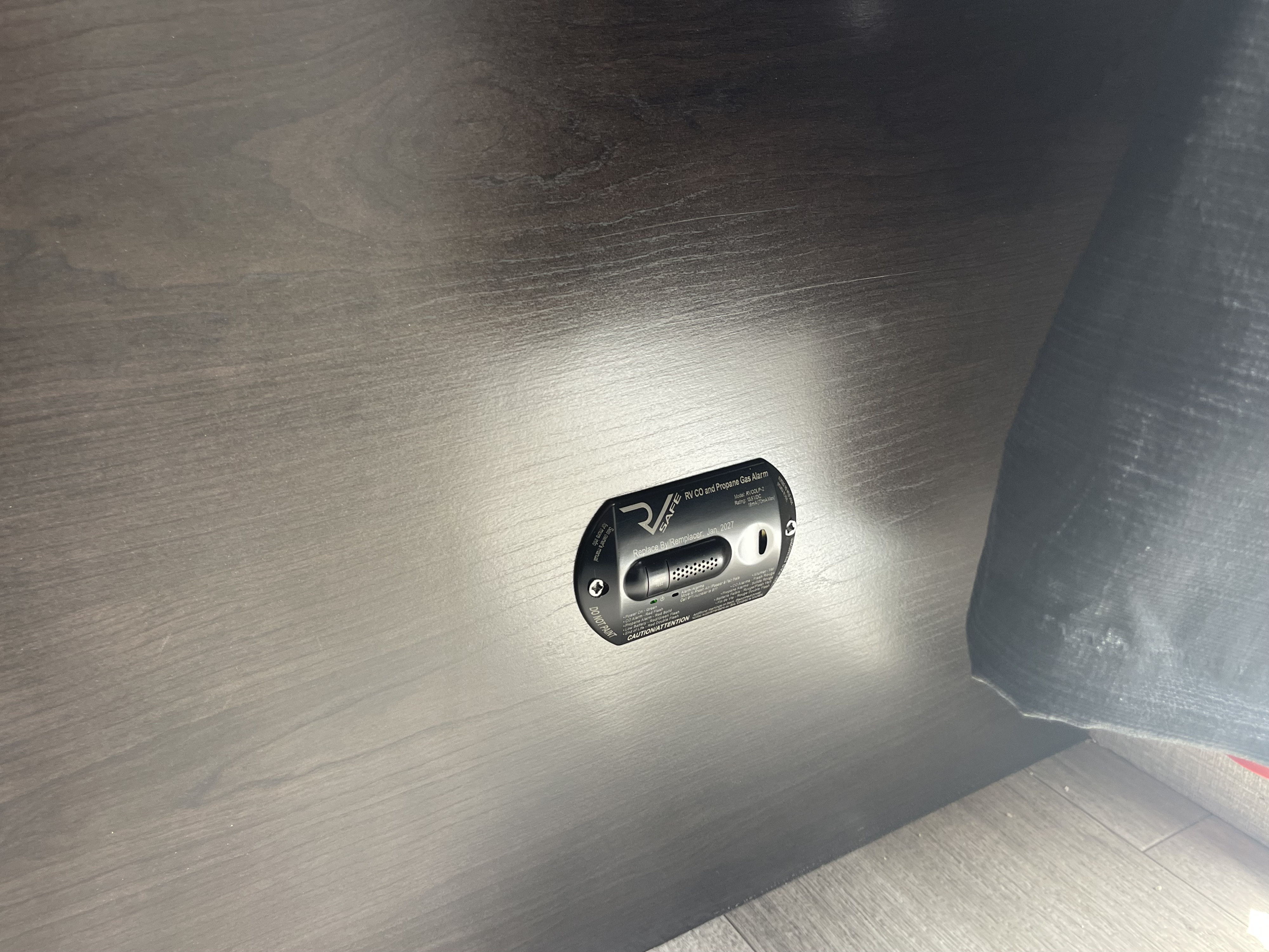 Essential RV rental safety: a carbon monoxide and propane gas alarm. Note the 'Replace By Jan 2027' date.. Jayco Jay Flight SLX 7 184BS 2022