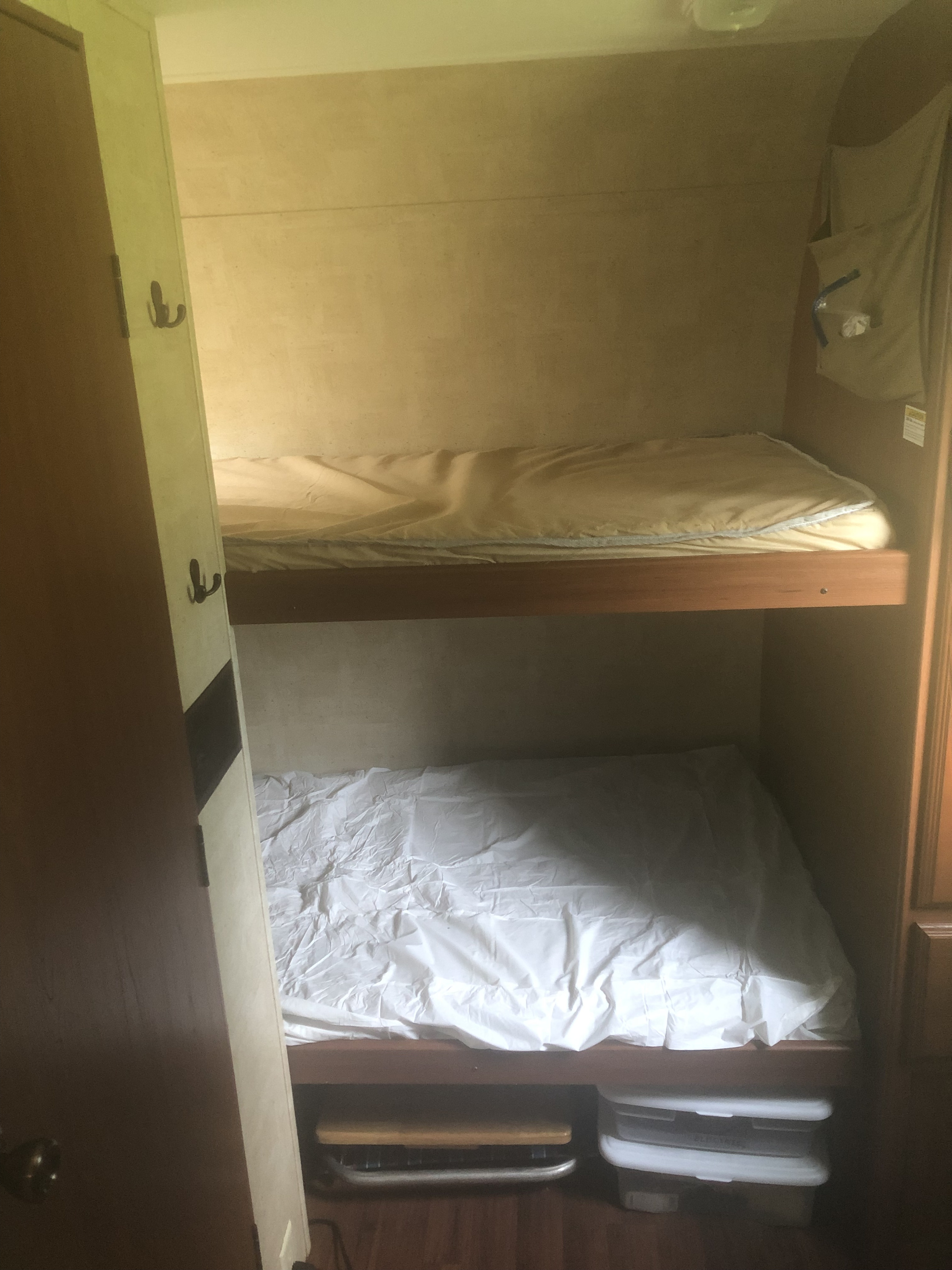 2 beds on front side of camper . Keystone RV Outback 2011