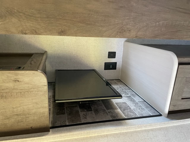 RV rental: Cozy bunk area features a small TV, USB, and power outlets. Functional space for compact living.. Forest River Evo 2020