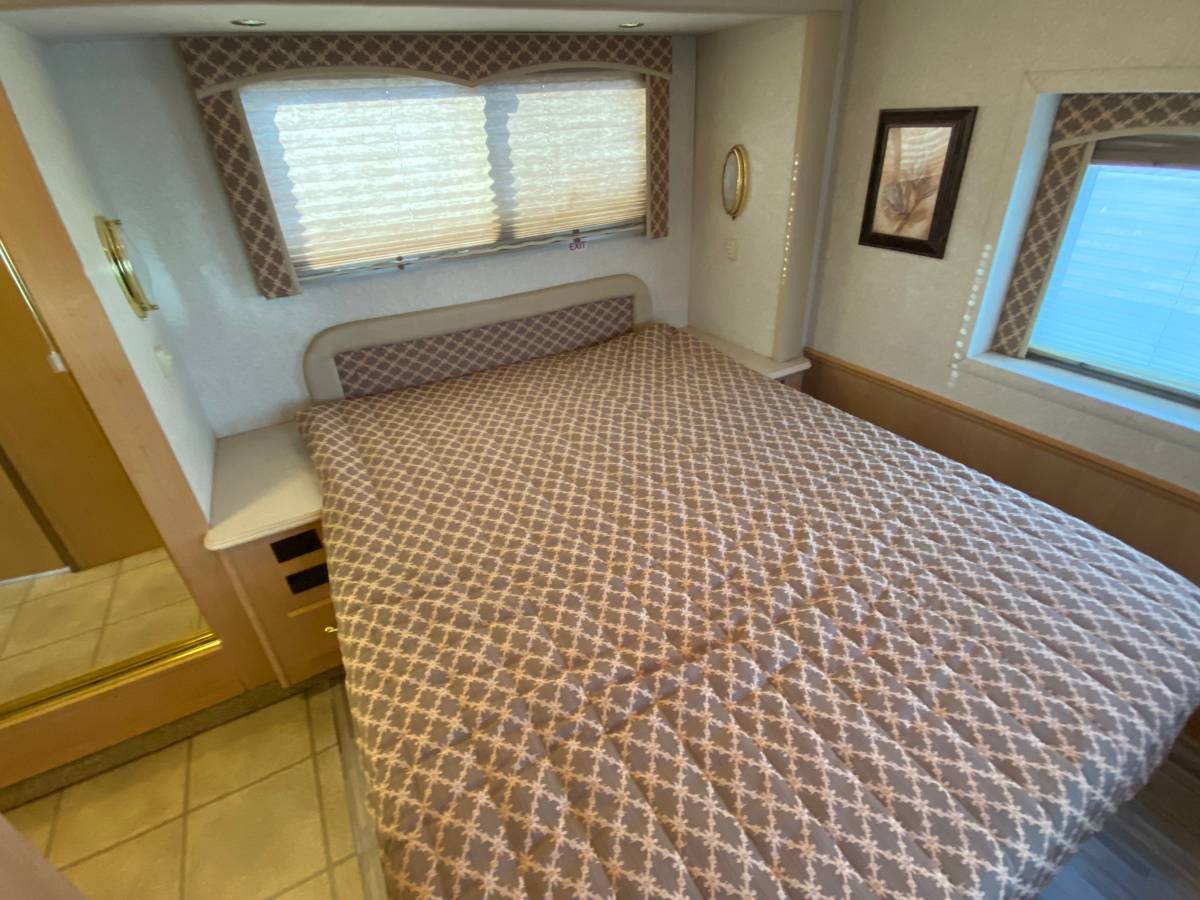 Roomy Queen Size master Suite. National RV Dolphin 2004