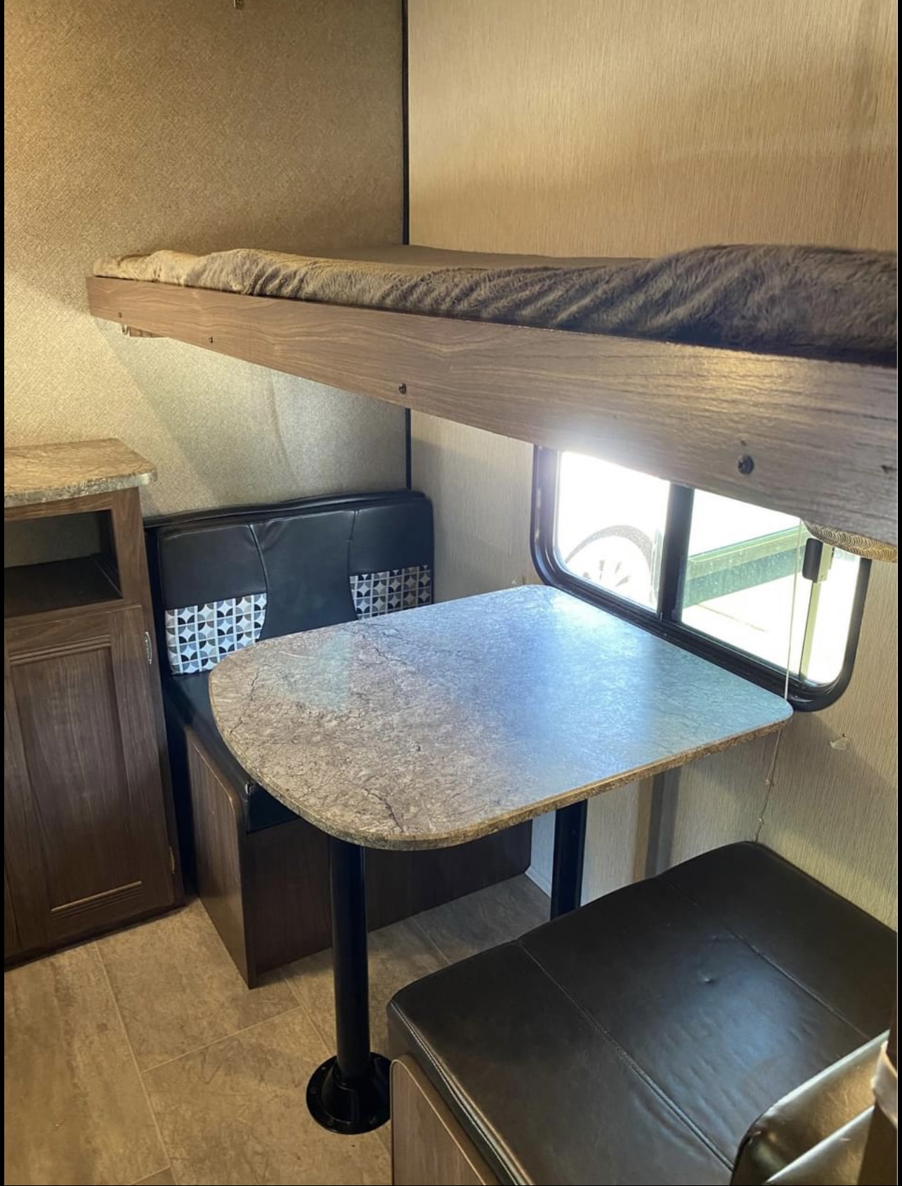 Bunkhouse- small sitting area that can be made into a bed! . Heartland RVs Trail Runner 2019