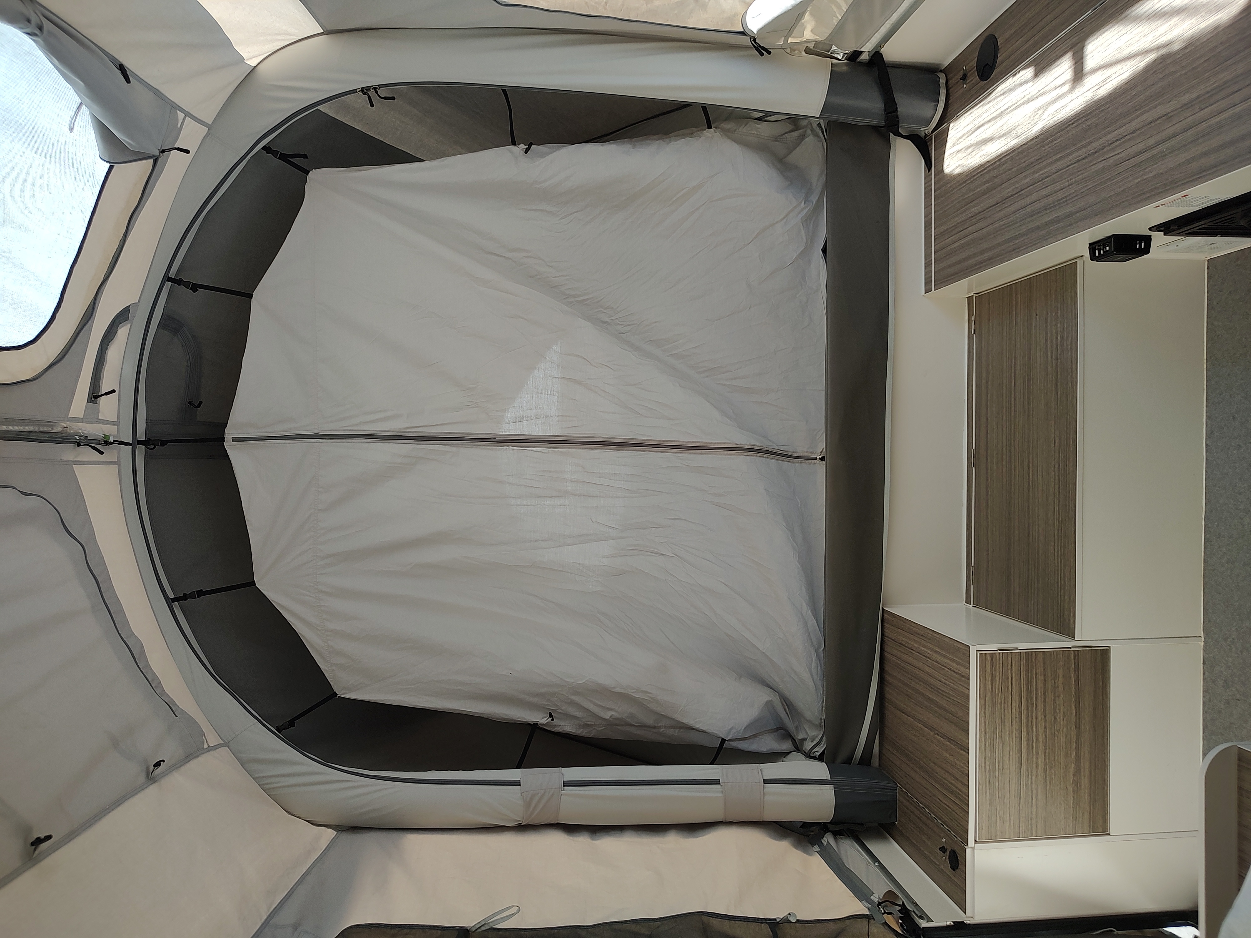 Sleeping area with privacy fabric zipped up. Opus Camper Opus Camper Popup Trailer 2021