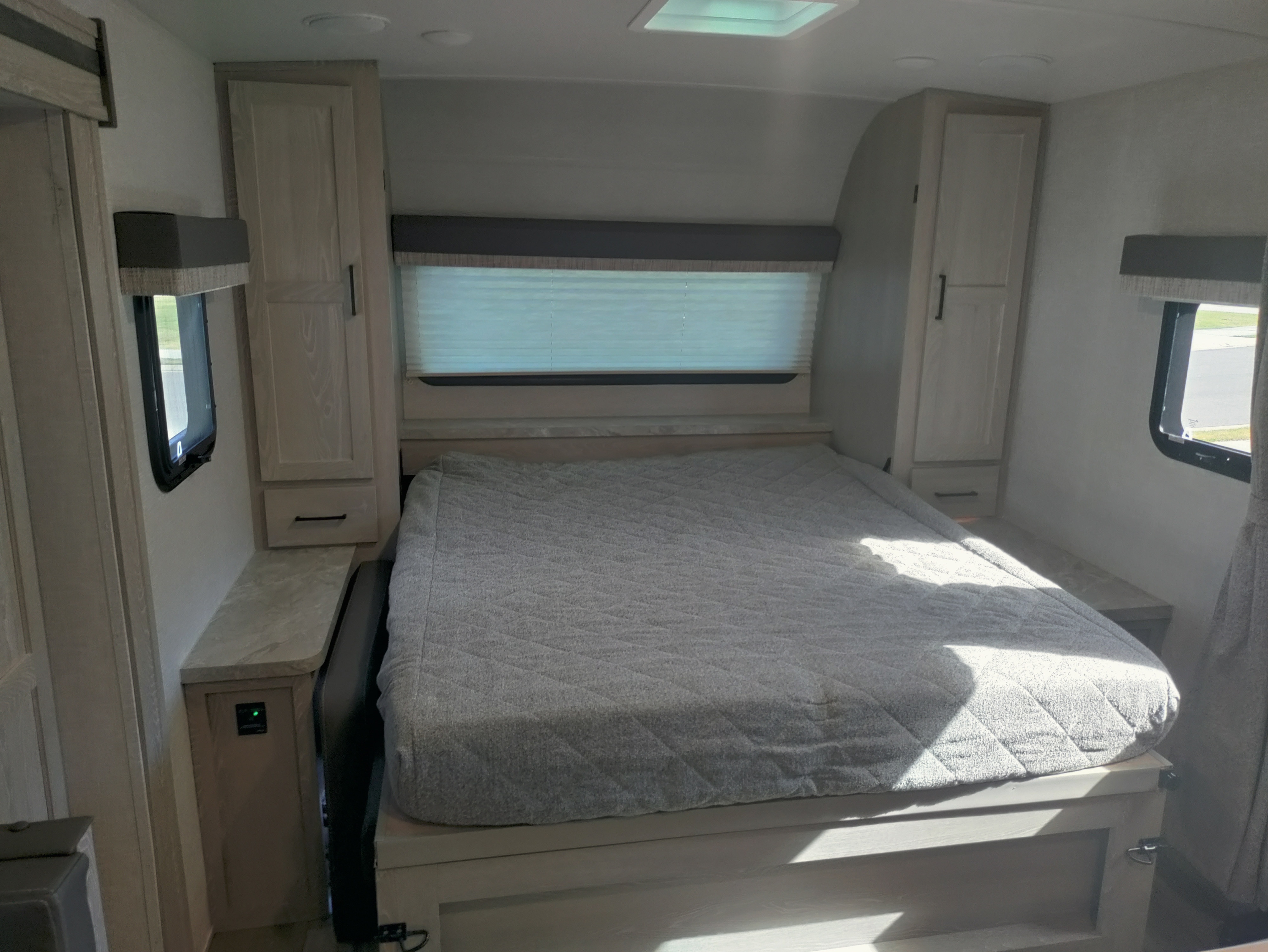 The love seat folds into a queen size bed and has storage for hanging clothes.. Forest River Flagstaff Micro Lite 2022