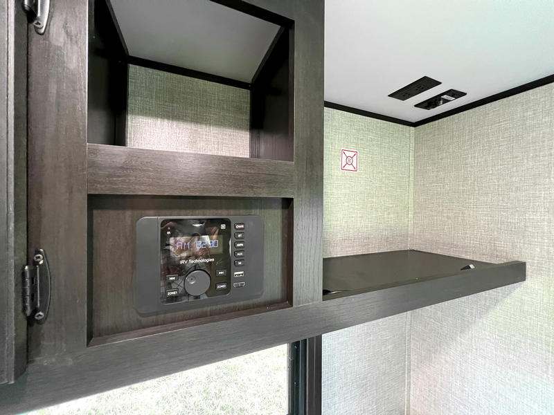 RV rental interior: iRV Technologies stereo, wall outlets, and a TV mount symbol for your onboard entertainment.. jayco Jay Flight 2022
