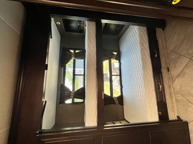 RV rental: view of two cozy bunk beds with quilted mattresses and windows, providing comfortable sleeping space.. Berkshire XLT 2017