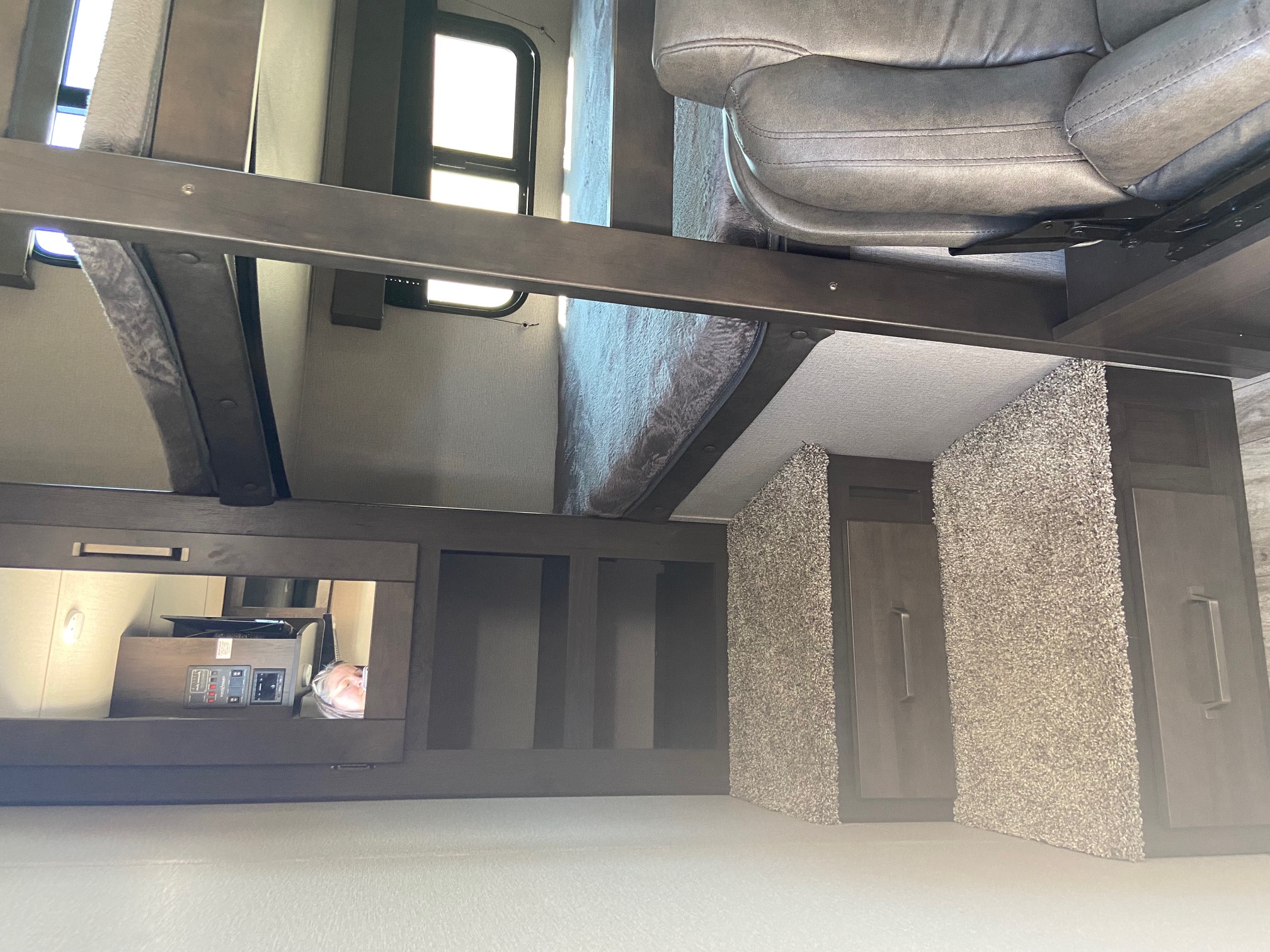 RV rental interior: cozy bunk beds, a comfy sofa, and smart storage maximize living space for travel.. Grand Design 265BH 2022