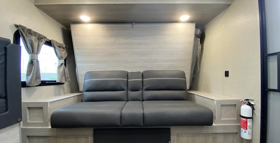 Couch area that converts to RV Queen size bed. Coachmen Catalina Summit 2022