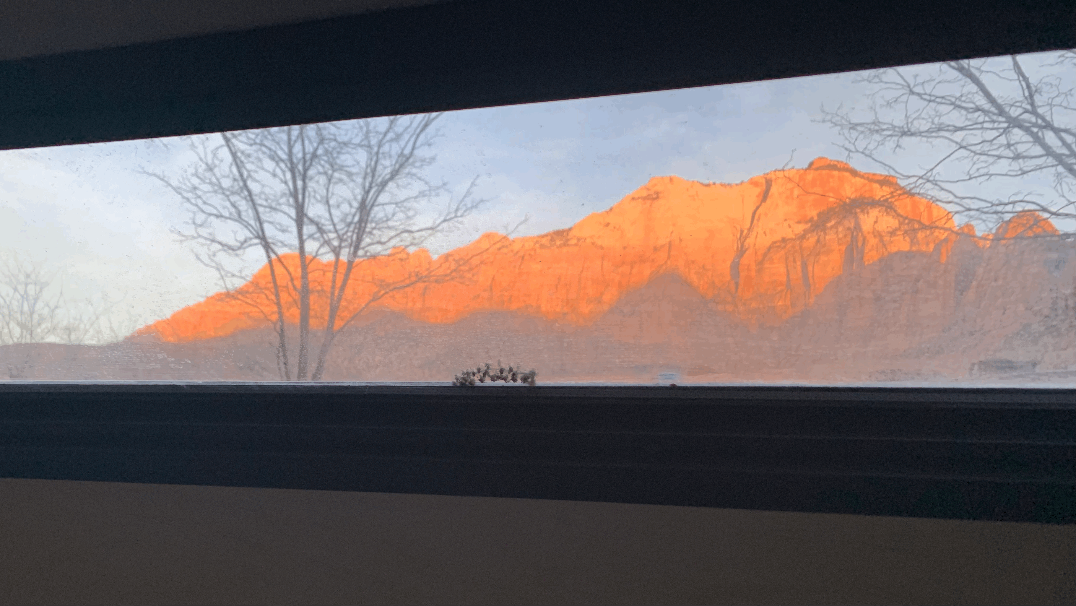 Sunrise through the stargazer window - Zion National Park. Escapod Topo Original 2022