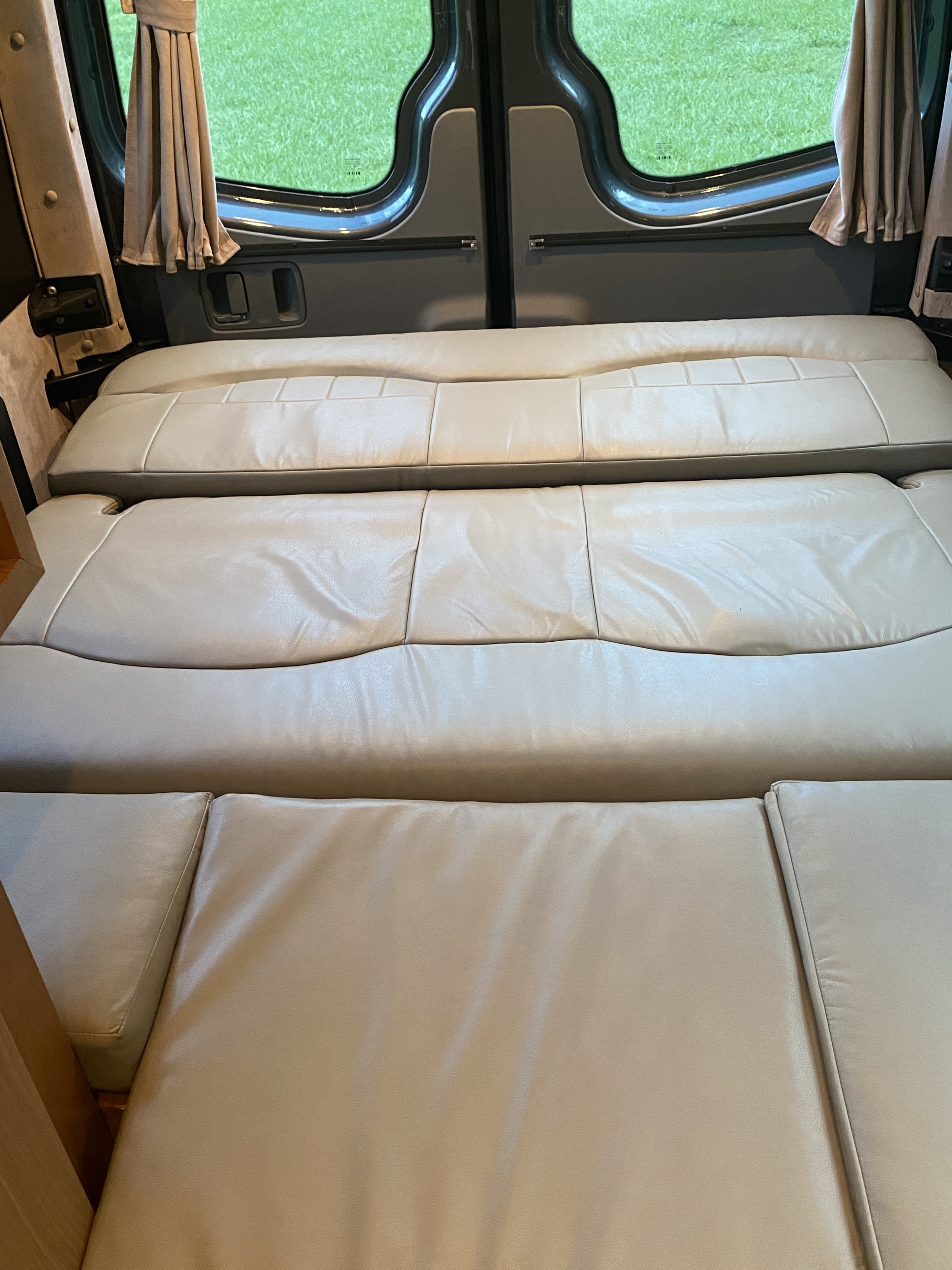 Sofa converted to RV queen size sleeping.. Winnebago Era 2010