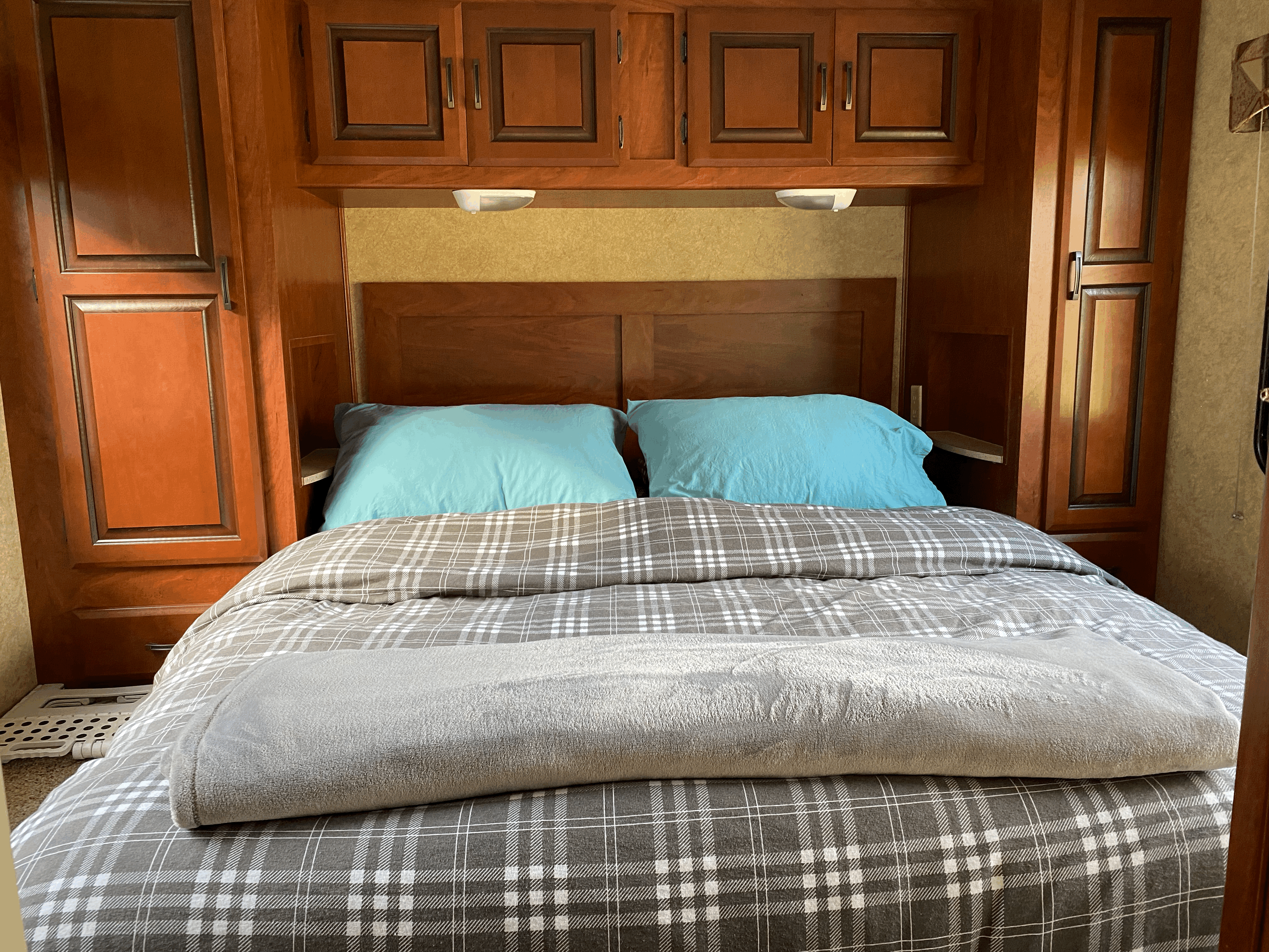 Very comfy queen Bed in separate sleeping quarters. . Forest River Sunseeker 2012