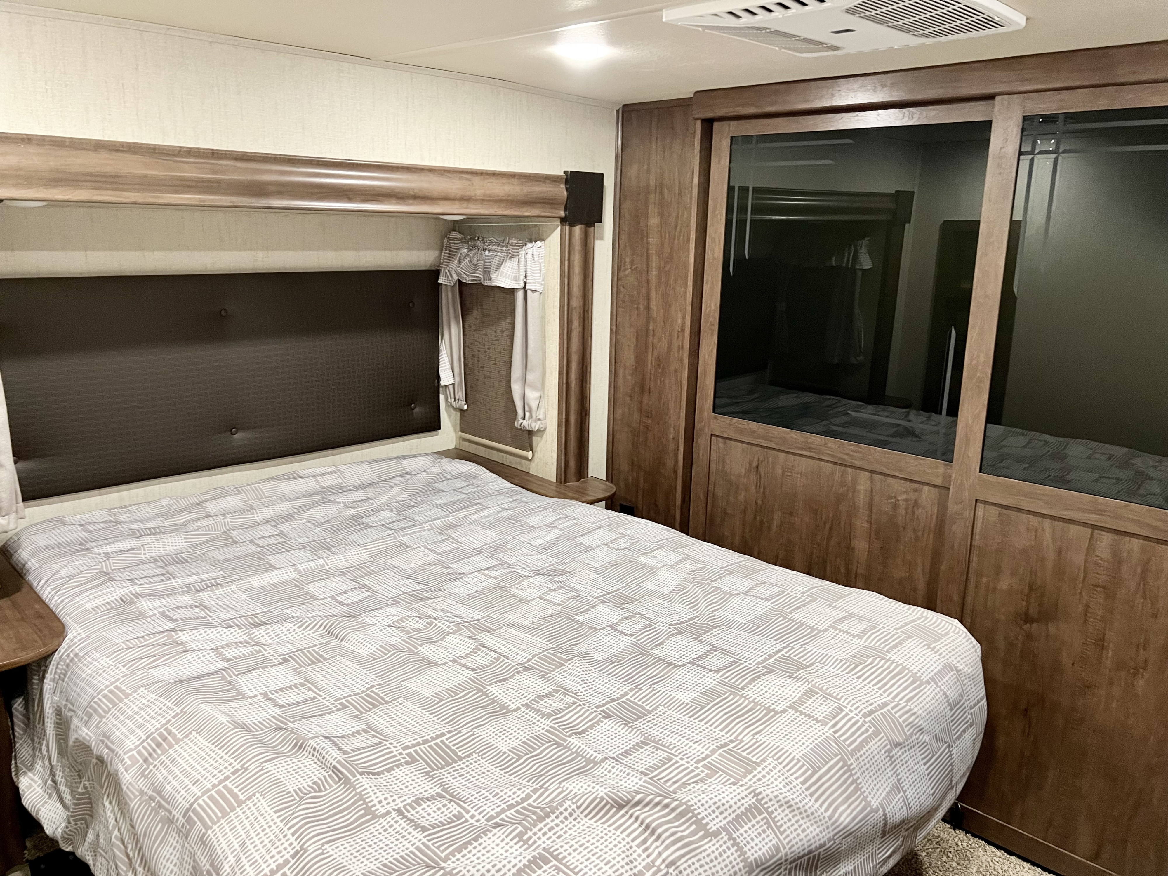 Master bedroom with large closet.. Forest River Sierra 2019