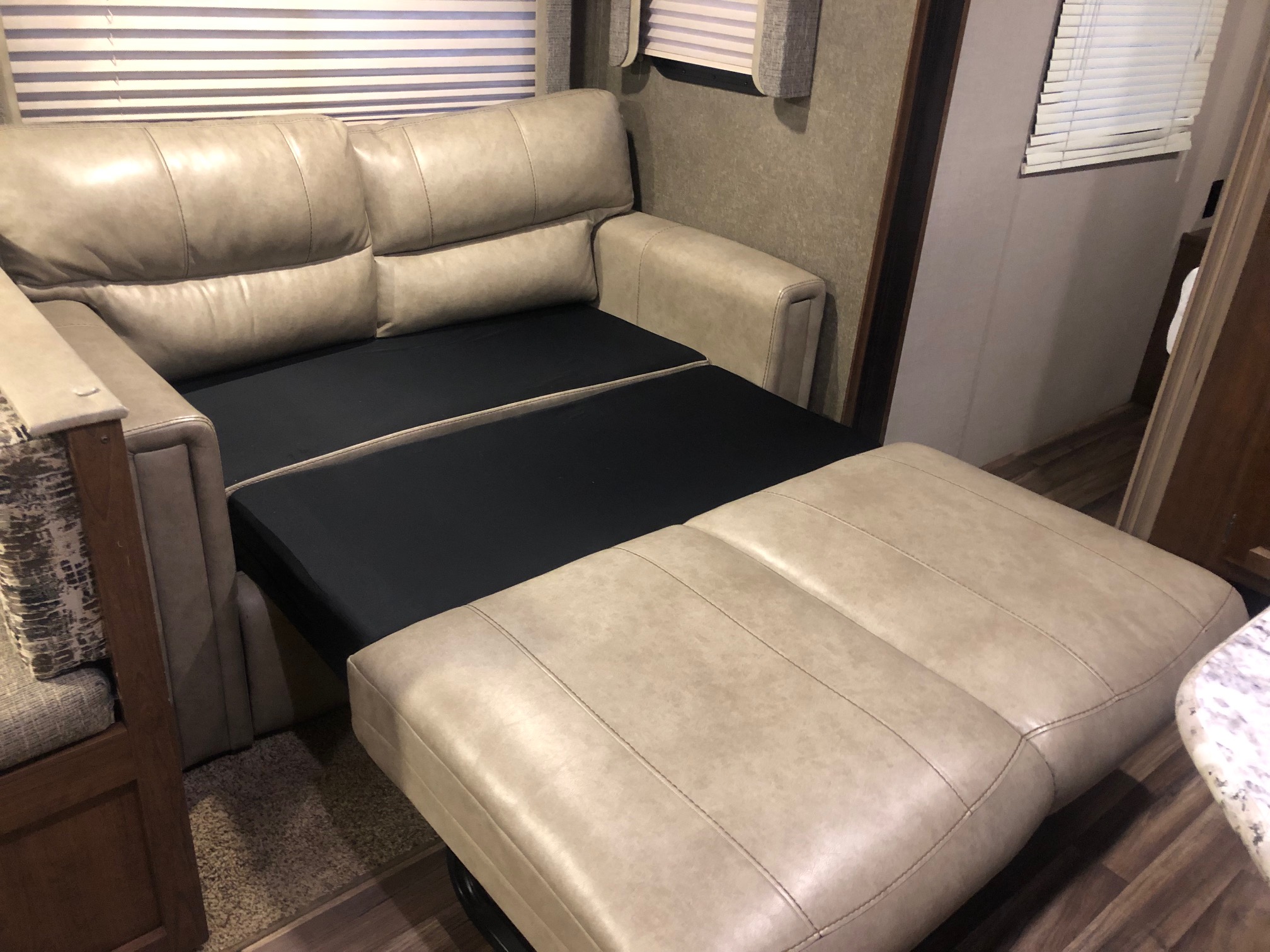 Couch converted for sleeping.. Keystone Hideout 2018