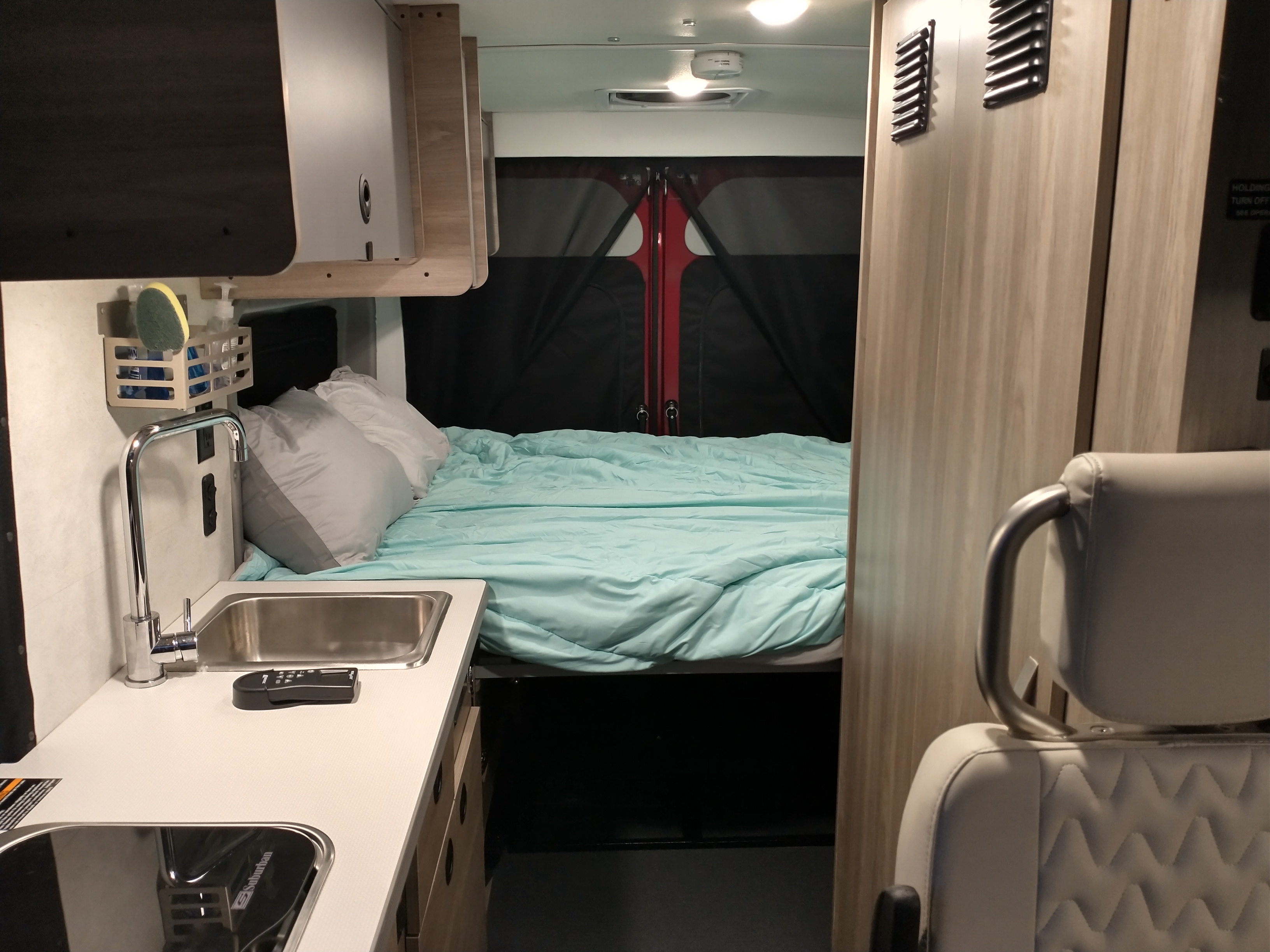 Queen bed in the back of the RV. Converts to Murphy bed when not in use. . Winnebago Solis 2022