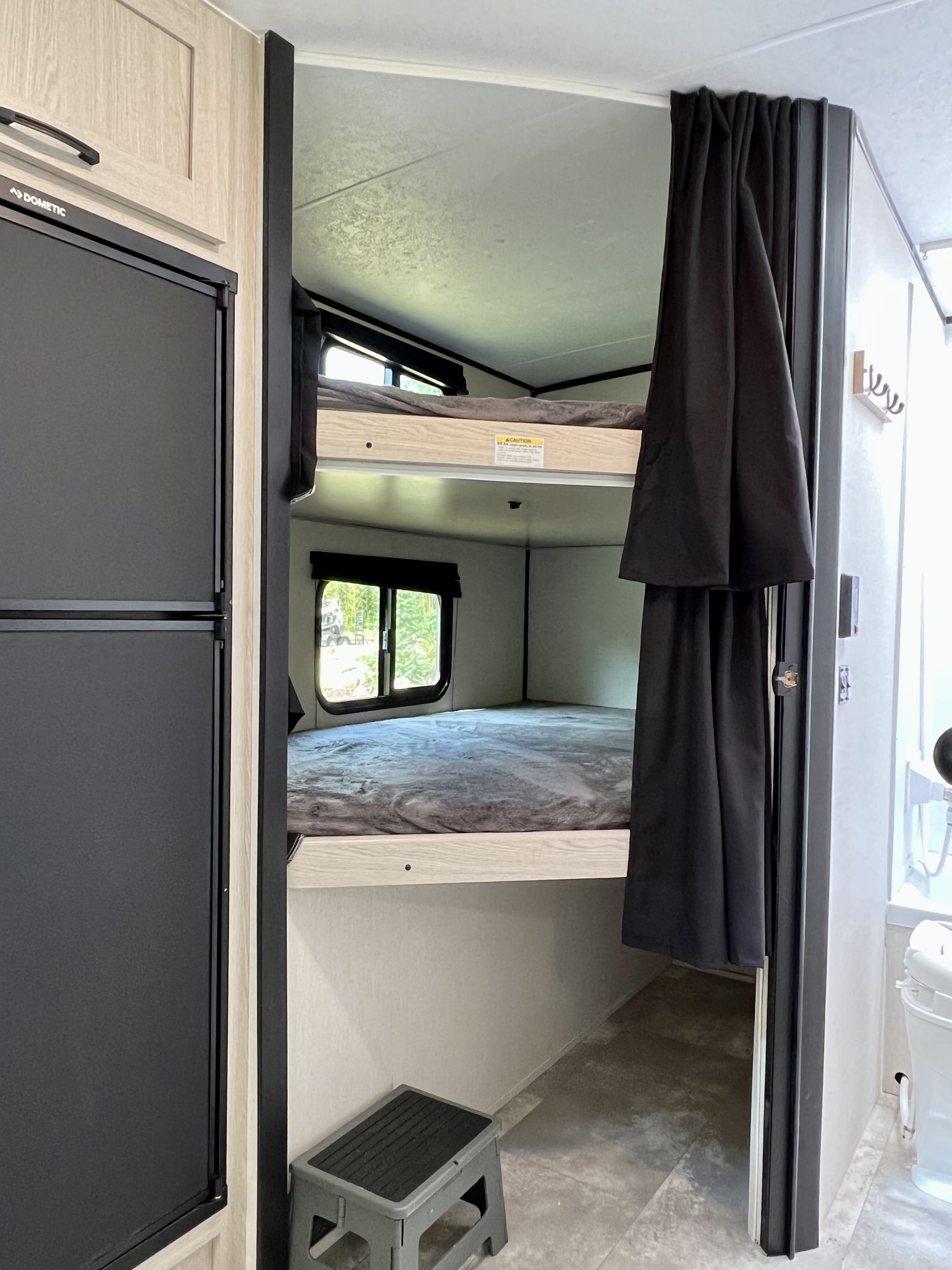 2 big bunk beds and ground level storage area.. Coachmen Apex 2021