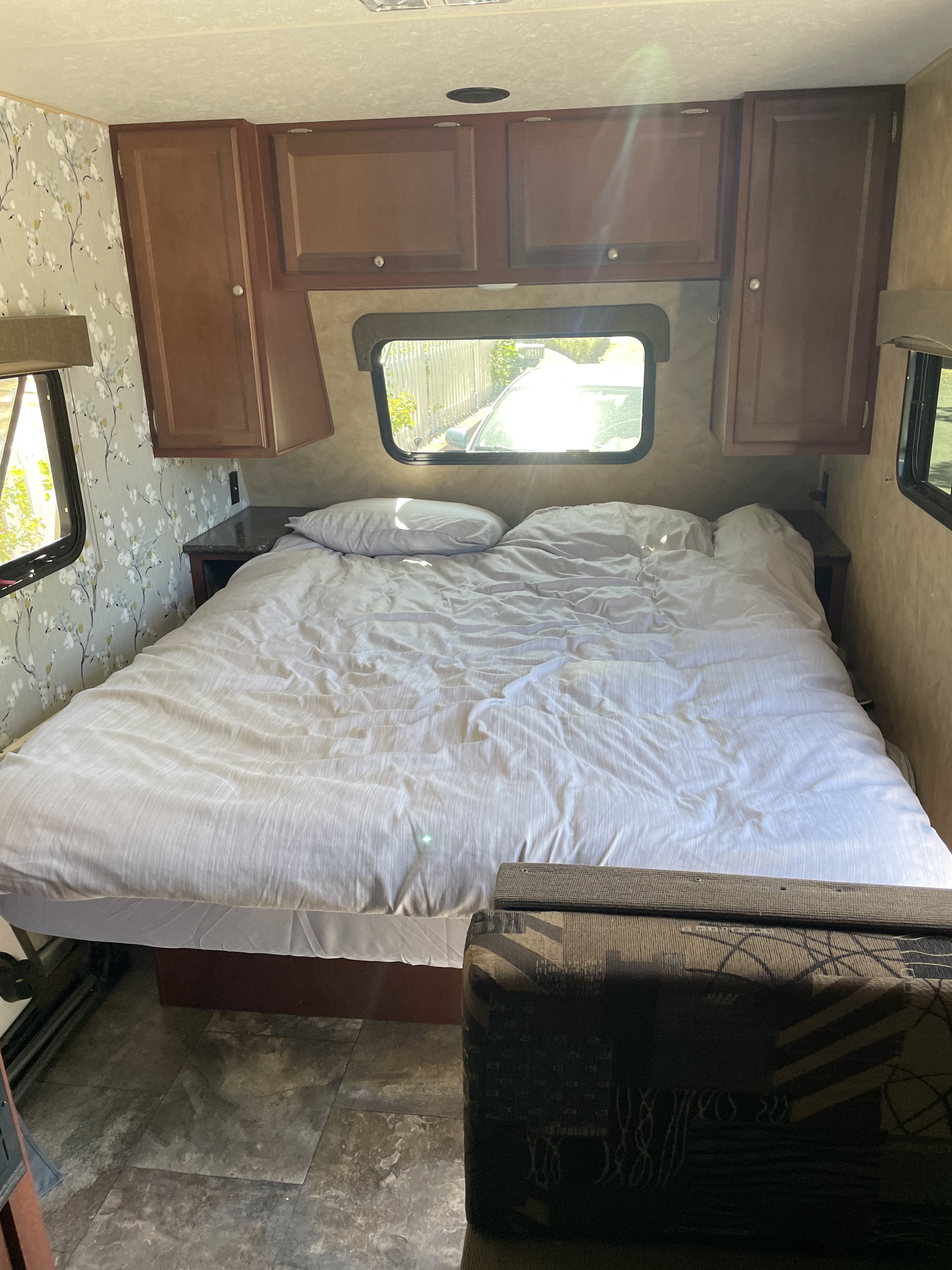 Queen-Size bed with comforter, pillow and linens. Forest River Viking 2015