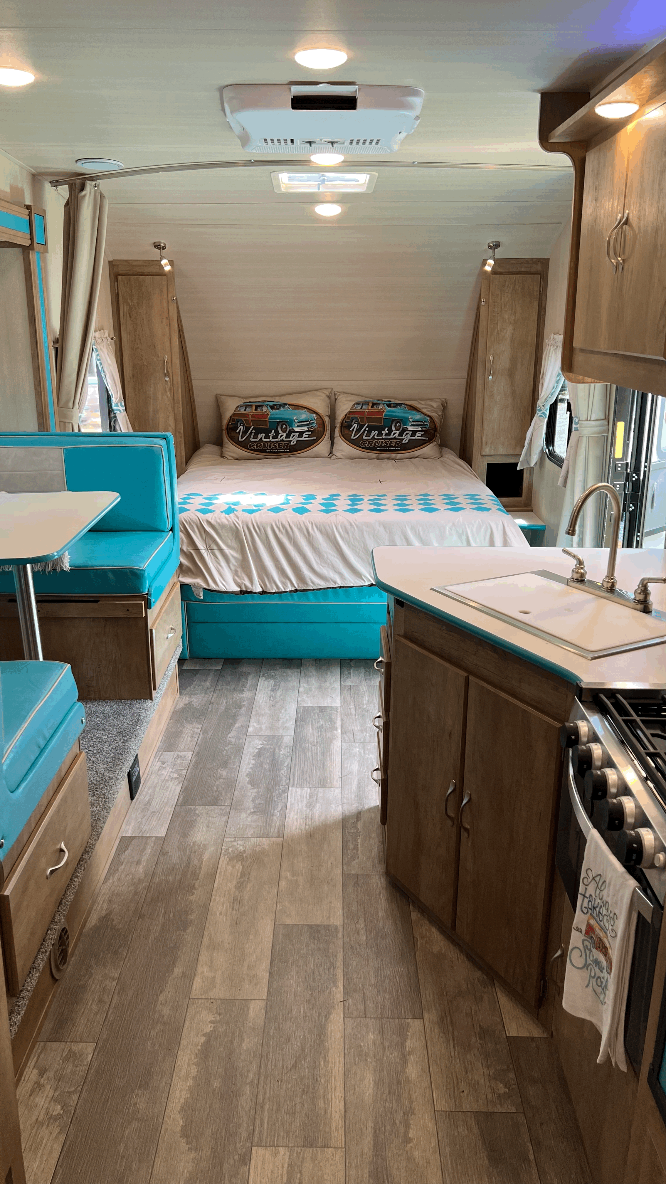 Relax in a comfy queen bed after a day of exploring. Gulf Stream Vintage Cruiser 2021