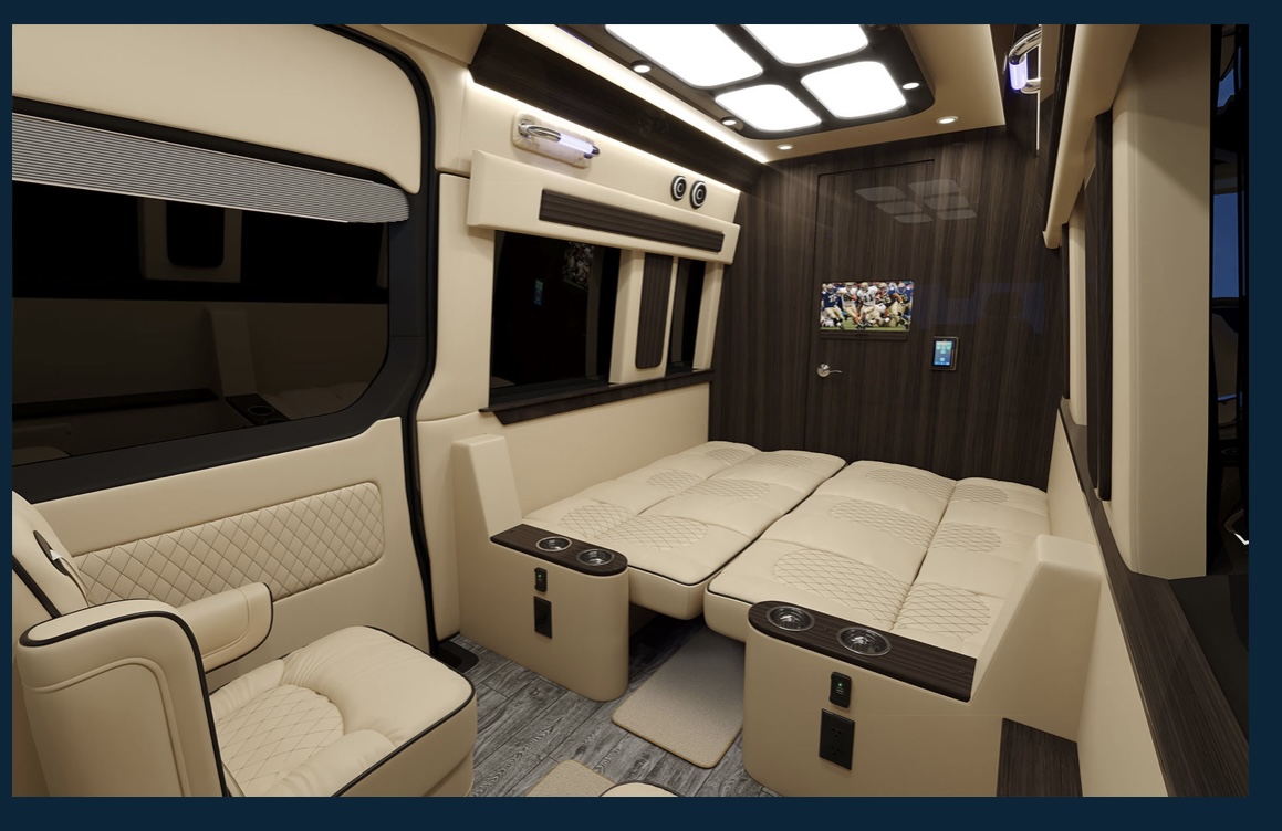 Luxury RV rental interior: cream convertible seating/beds, dark wood, TV, and ambient lighting for ultimate comfort.. Ultimate Toys Other 2022