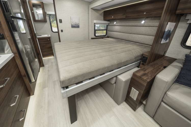 This RV rental offers a smart, multi-functional interior with a fold-down bed, comfortable seating, and a modern kitchen area.. Winnebago View 24D 2023