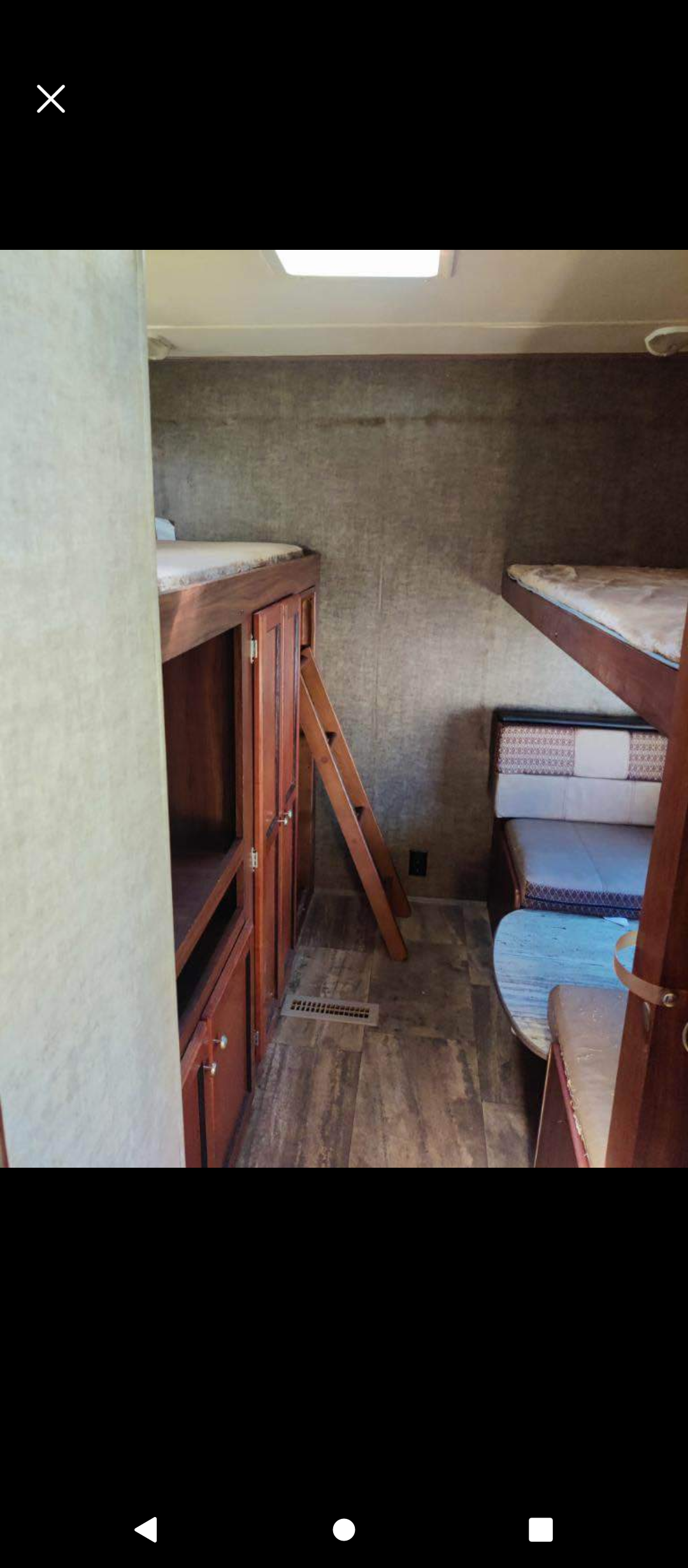 This is located in the back of the camper, 3 twin beds with closet and tv. Heartland RVs Trail Runner 2016