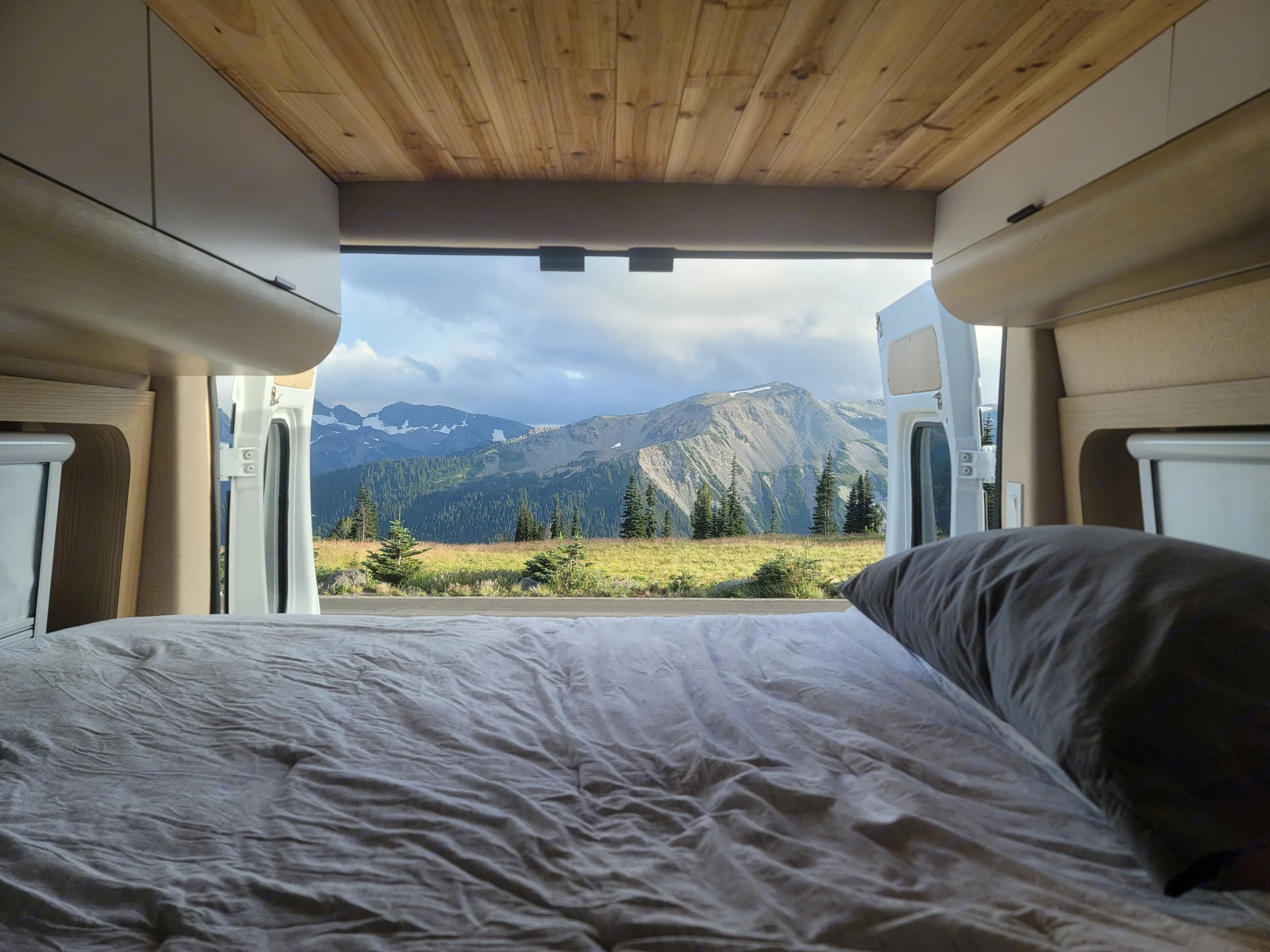 RV rental offers serene van life. Wake up to majestic mountains from your comfy camper bed in this cozy van.. Dodge Ram Promaster 2500 2022