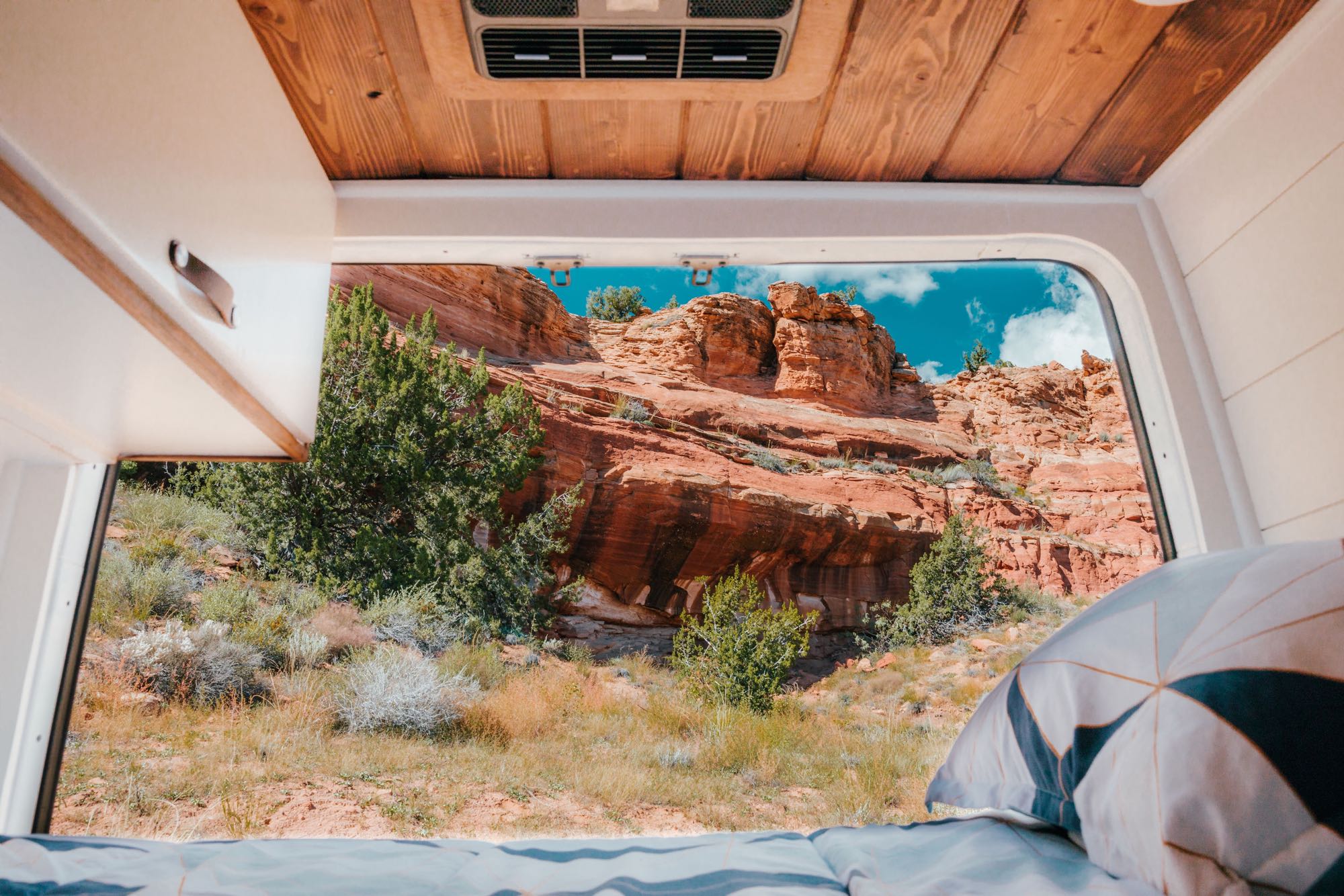 Wake up to majestic red rock landscapes from your RV rental bed. Experience van life adventure and stunning nature views!. Mercedes-Benz Sprinter RV Motorhome Campervan 2022