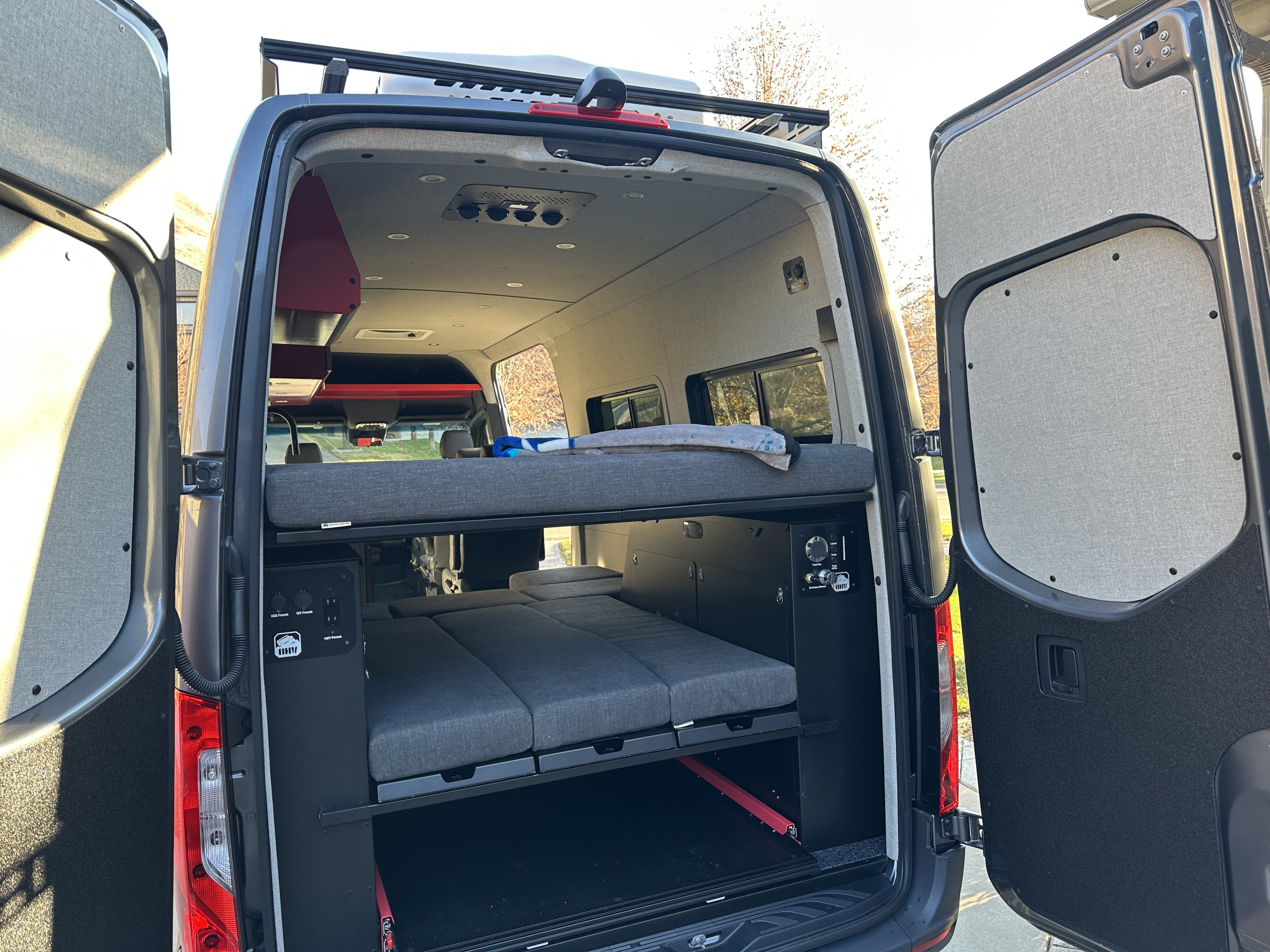 TWO BED CONFIGURATION: Configured with one queen bed (above) and one full bed (below) leaving approximately an 18 inch tall space for gear storage.. Mercedes Benz Sprinter 2500 2022