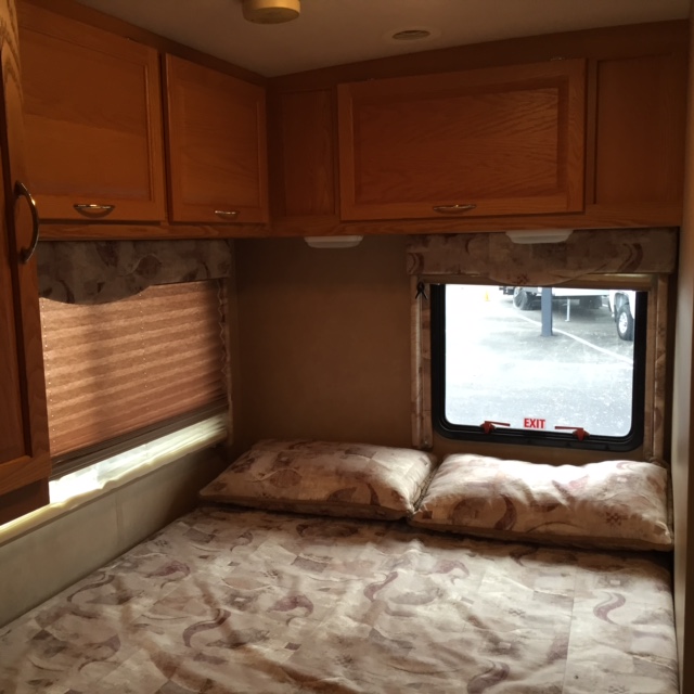 Full-size bed in the back.  We have supplie blankets, sheets and pillows. . Itasca Spirit 2006