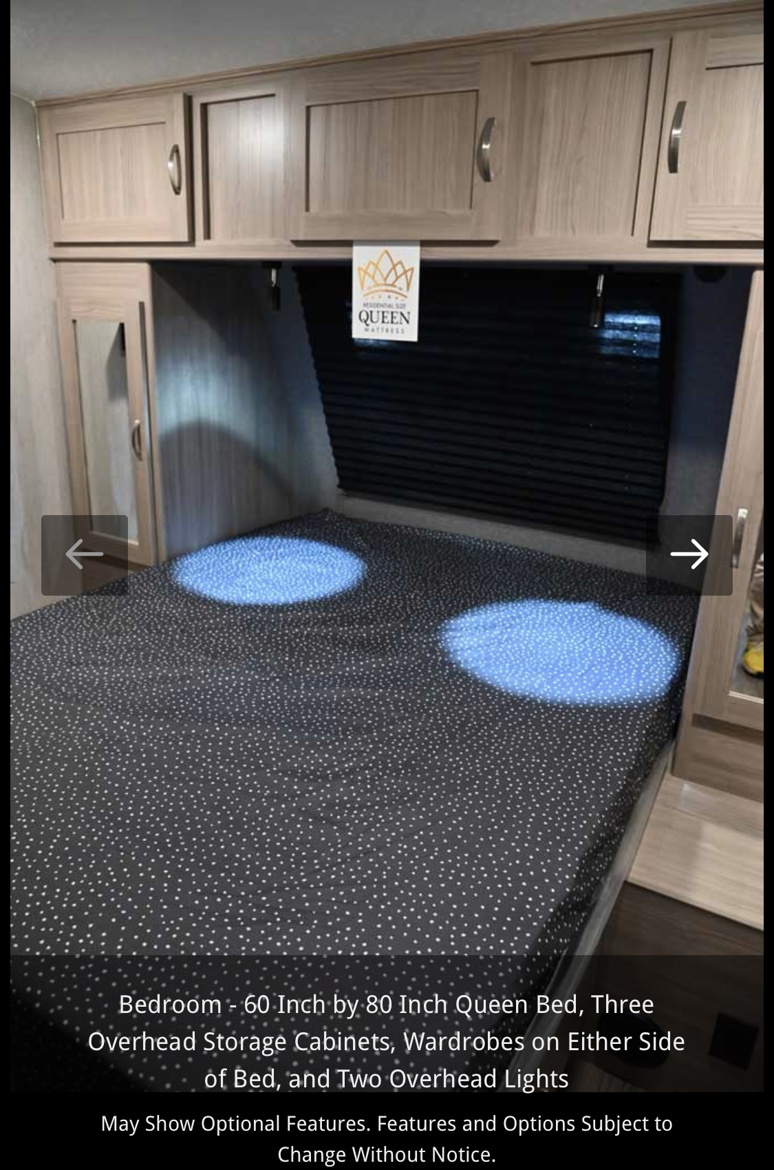 RV rental bedroom: Queen bed, overhead storage, dual wardrobes, and illuminated by two overhead reading lights.. Forest River Coachmen Freedom Express Ultra Lite 2020