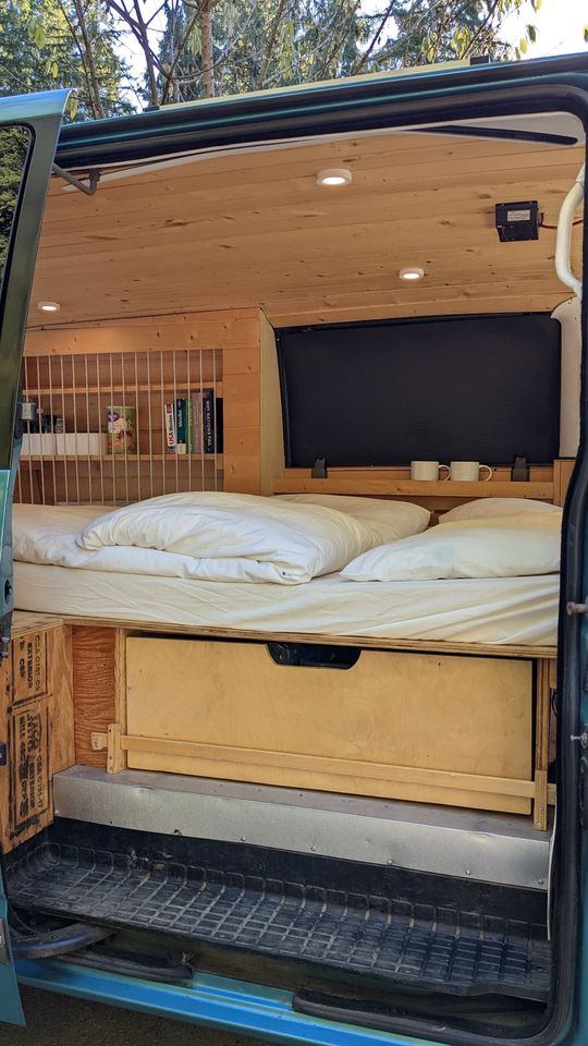 Side door view of bed and living space. Chevrolet Other 1996