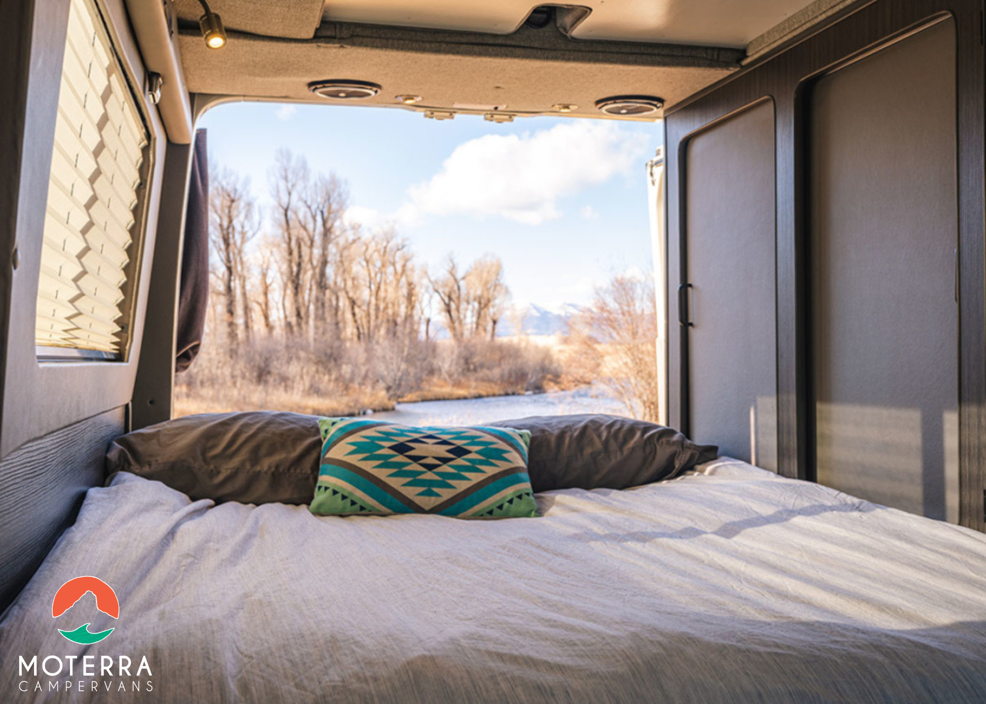 Enjoy nature from your cozy RV rental. This campervan features a comfy bed with a river view and ample storage.. Mercedes-Benz Sprinter 2020