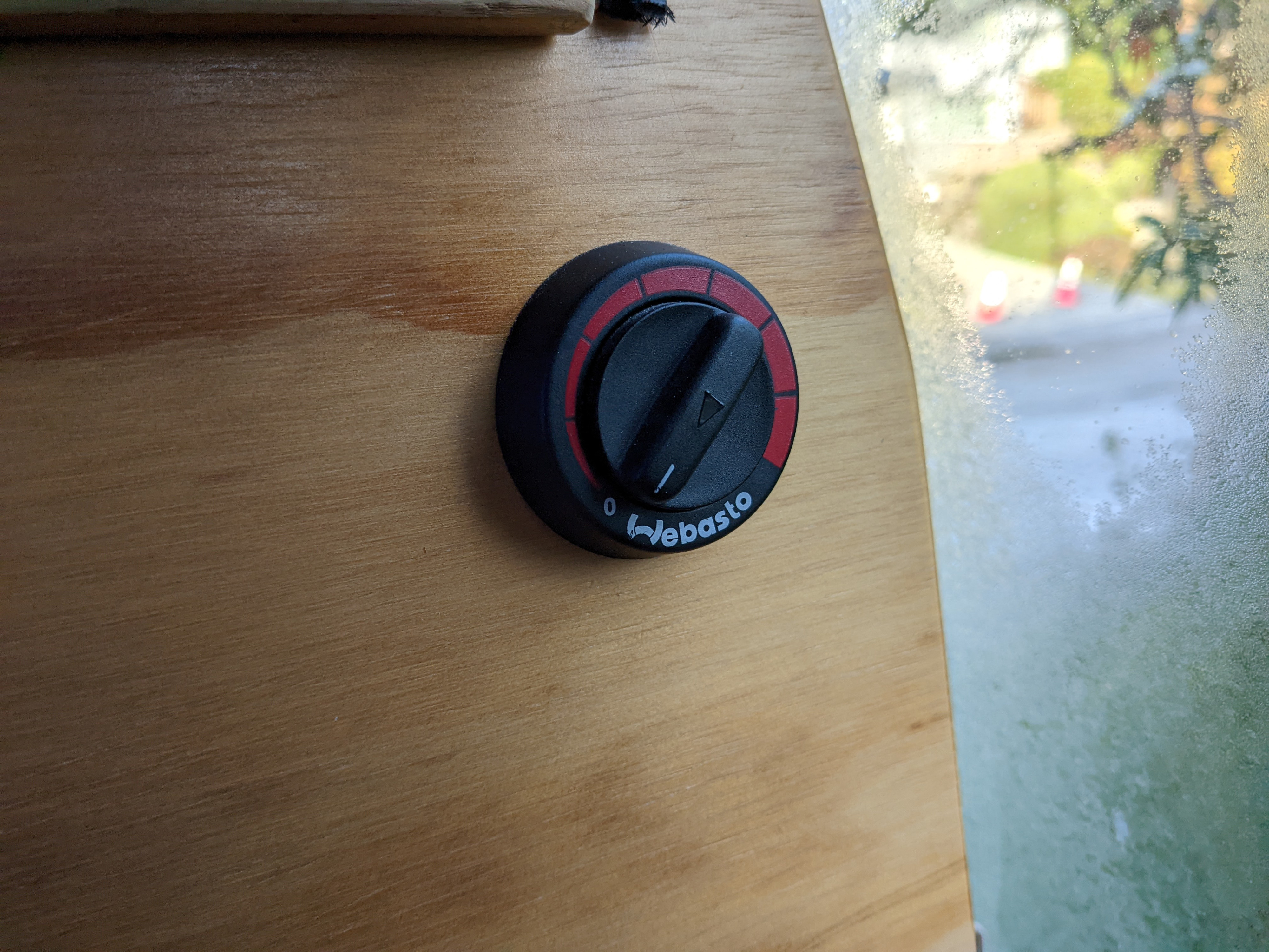 This thermostat controls the genuine Webasto Heather, professionally installed, which runs off the gas tank. It sips gas at ~0.4 gallons per night. . Volkswagen Vanagon 1987