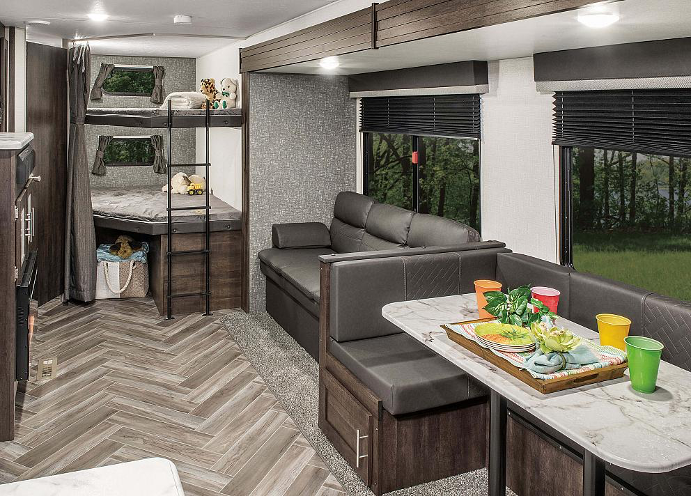 Double bunks, jackknife sofa and dinette converts to sleeping areas for additional sleeping space. Sportsmen LE 2020