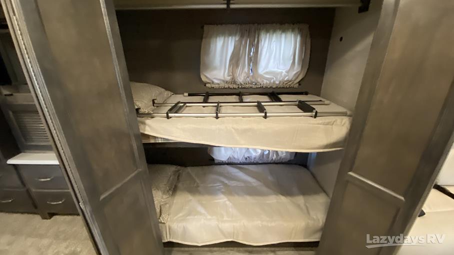 RV rental interior: cozy bunk beds with ladder, perfect for family sleeping in your travel trailer.. Other Other 2022