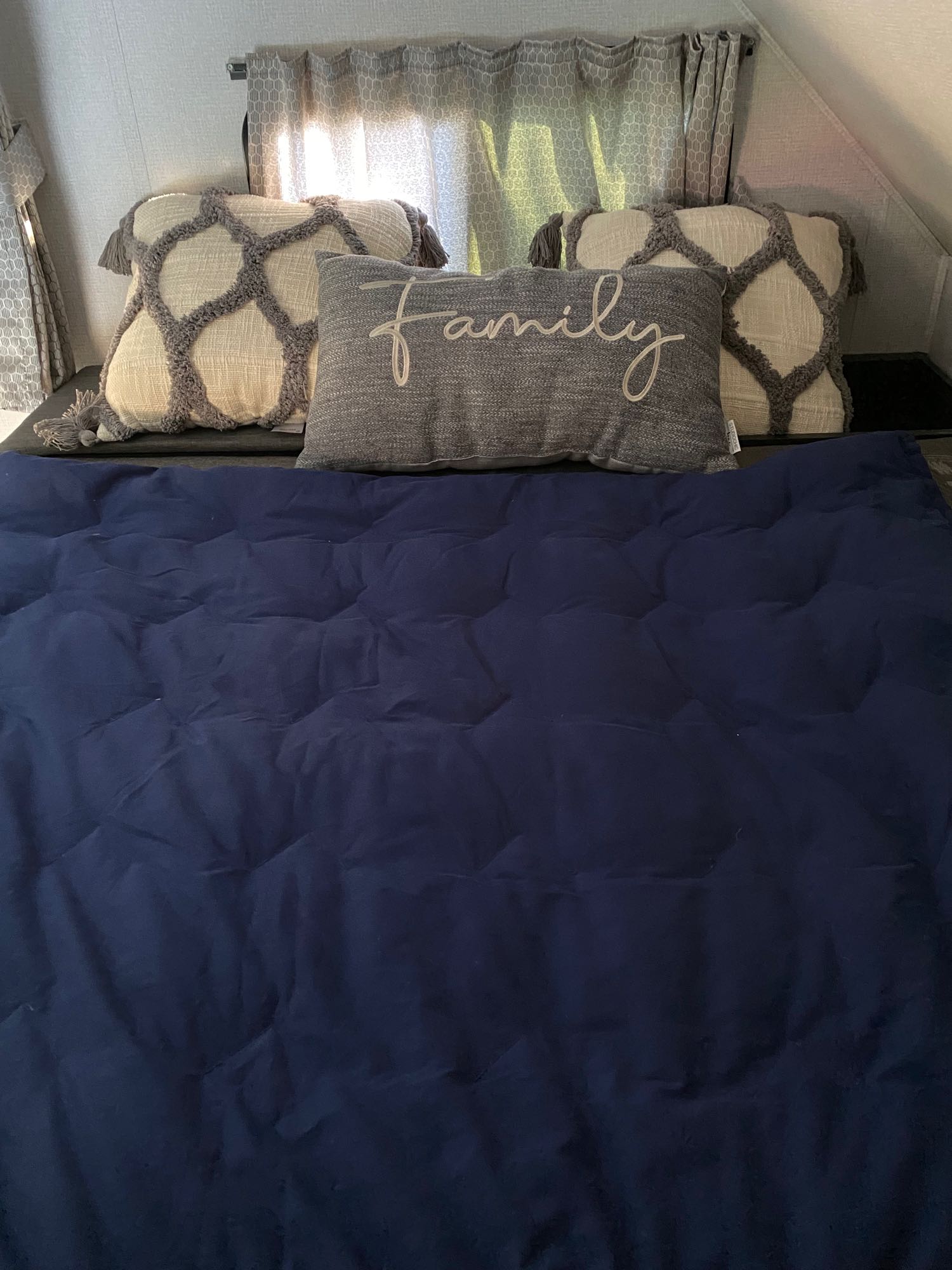 Queen bed above driver/passenger seats.. Forest River Sunseeker 2021