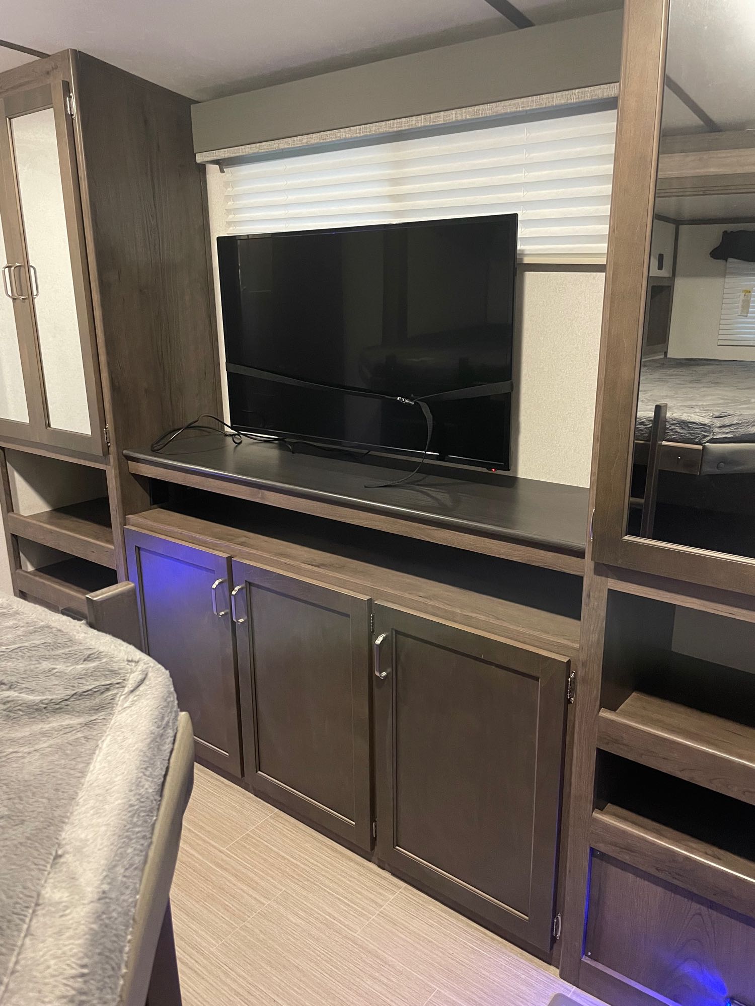 Bunk room entertainment center and lots of storage. Keystone RV Passport GT 2021
