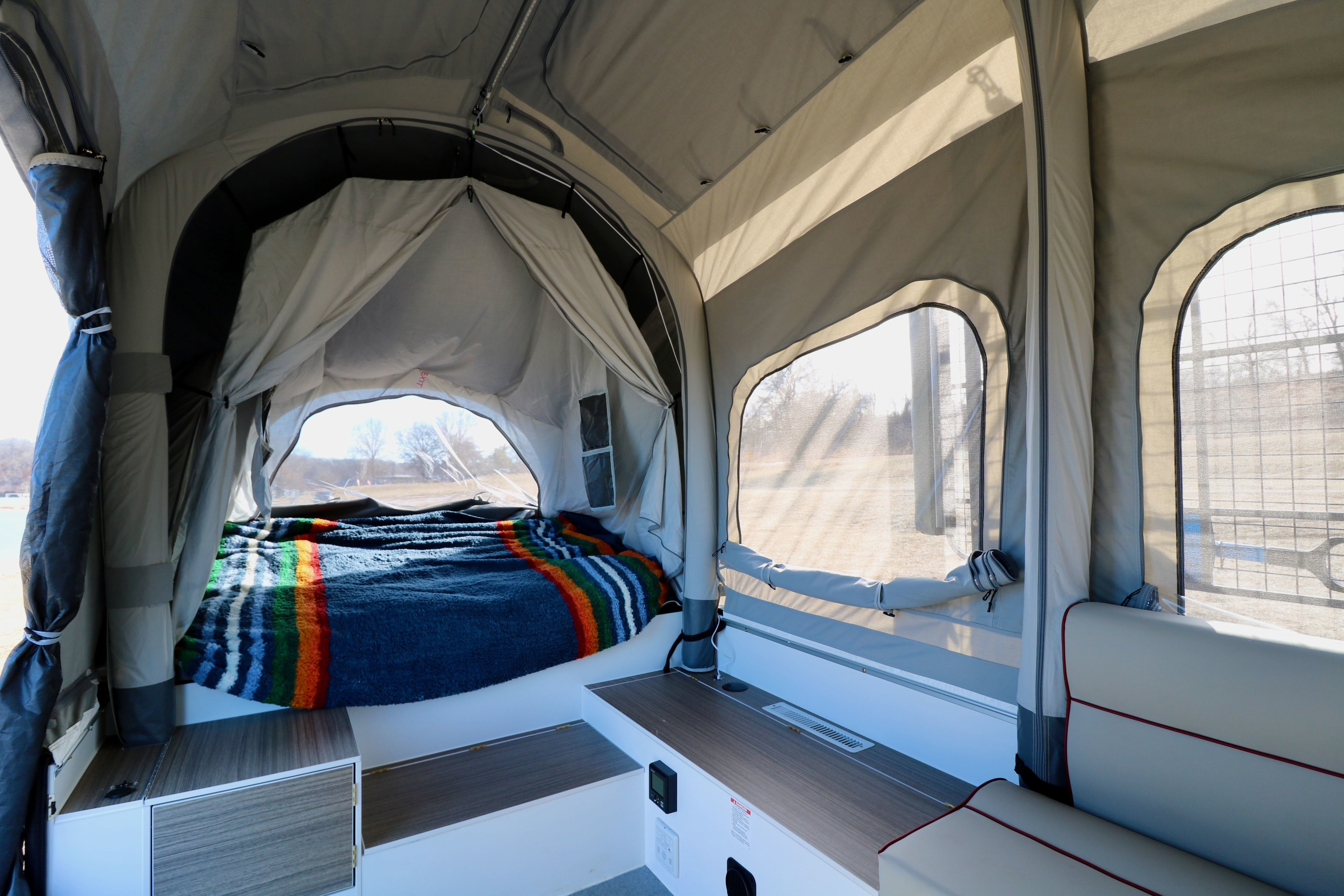 double bed at rear of trailer. Opus Camper Opus Camper Popup Trailer 2022