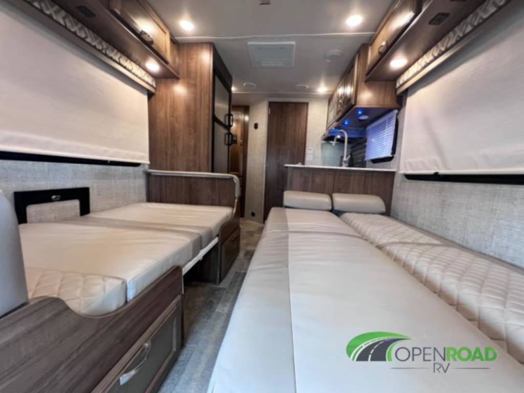 Experience cozy RV rental living! This RV features two comfortable sleeping areas, a compact kitchen, and overhead storage.. Gulf Stream B Touring 2020