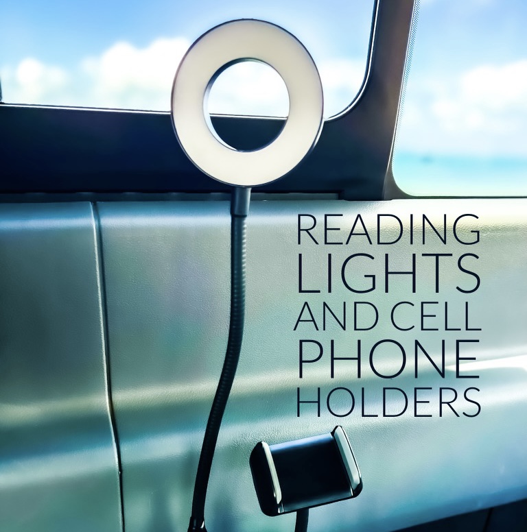 RV rental: A flexible arm with a circular LED reading light & a phone holder mounted inside a modern RV.. Ford Transit 2020
