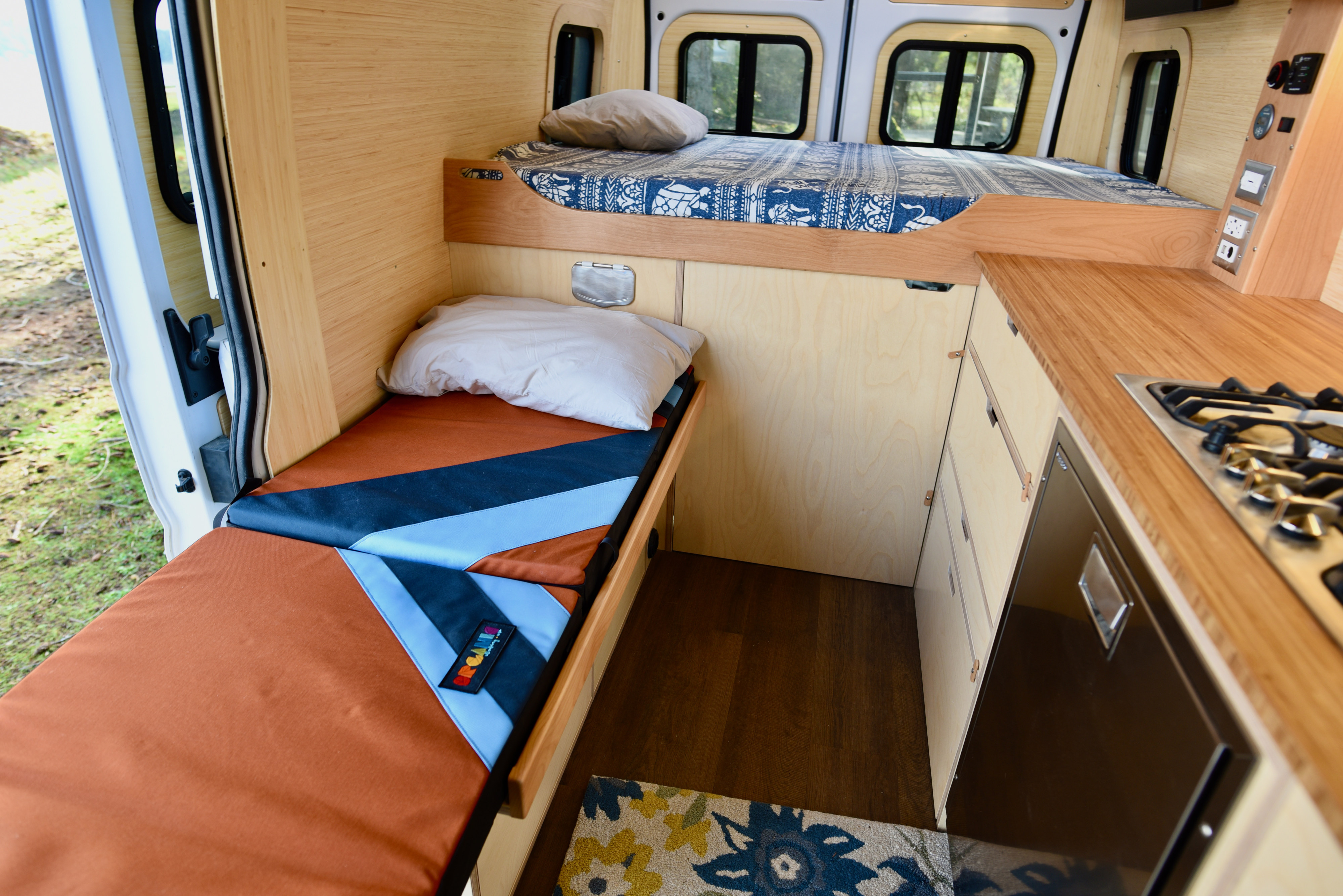 Additional sleeping berth for 3rd traveler.  Approximately 24" x 74". Converts to back to bench in 15 seconds.. Dodge Promaster 2021