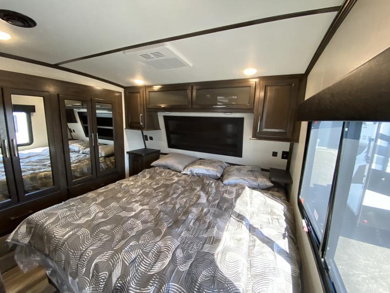 Master bedroom - King bed. Dutchmen Voltage 2022