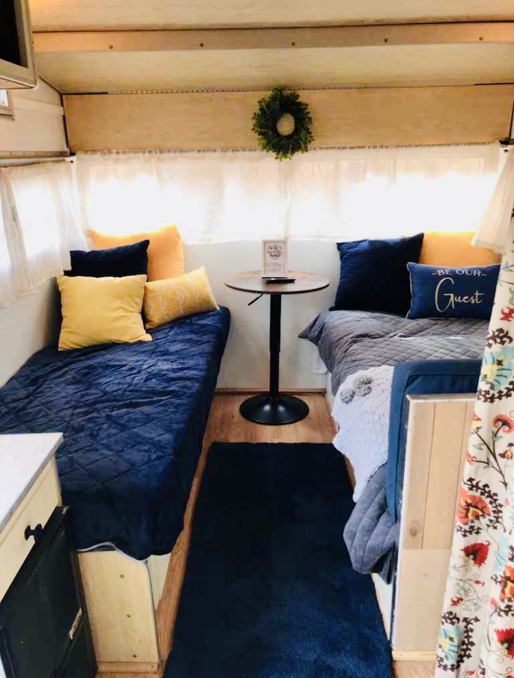There are two twin beds. A bunk bed folds down from the ceiling. A comfy fourth sleeping cushion for the floor is also included.. Shasta Other 1970