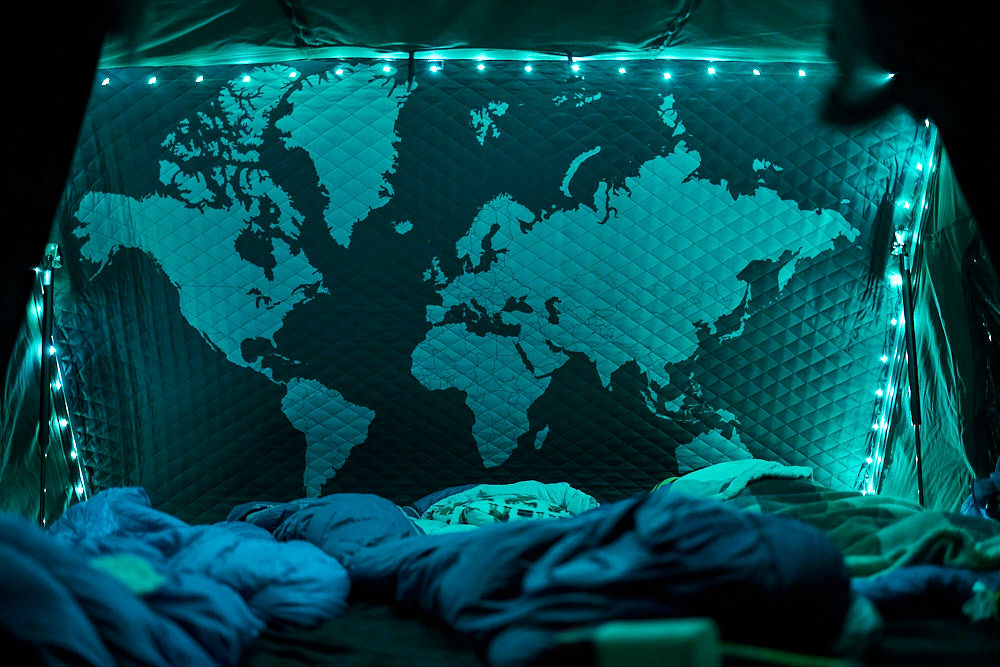 Cozy RV rental interior with a teal world map and string lights for your next adventure.. Mercedes-Benz Other 2014