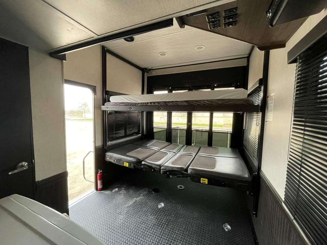 RV rental: Versatile toy hauler garage with power bunk beds & fold-down sofa/bed. Perfect for families or gear.. Heartland RVs Cyclone Toy Hauler 2019