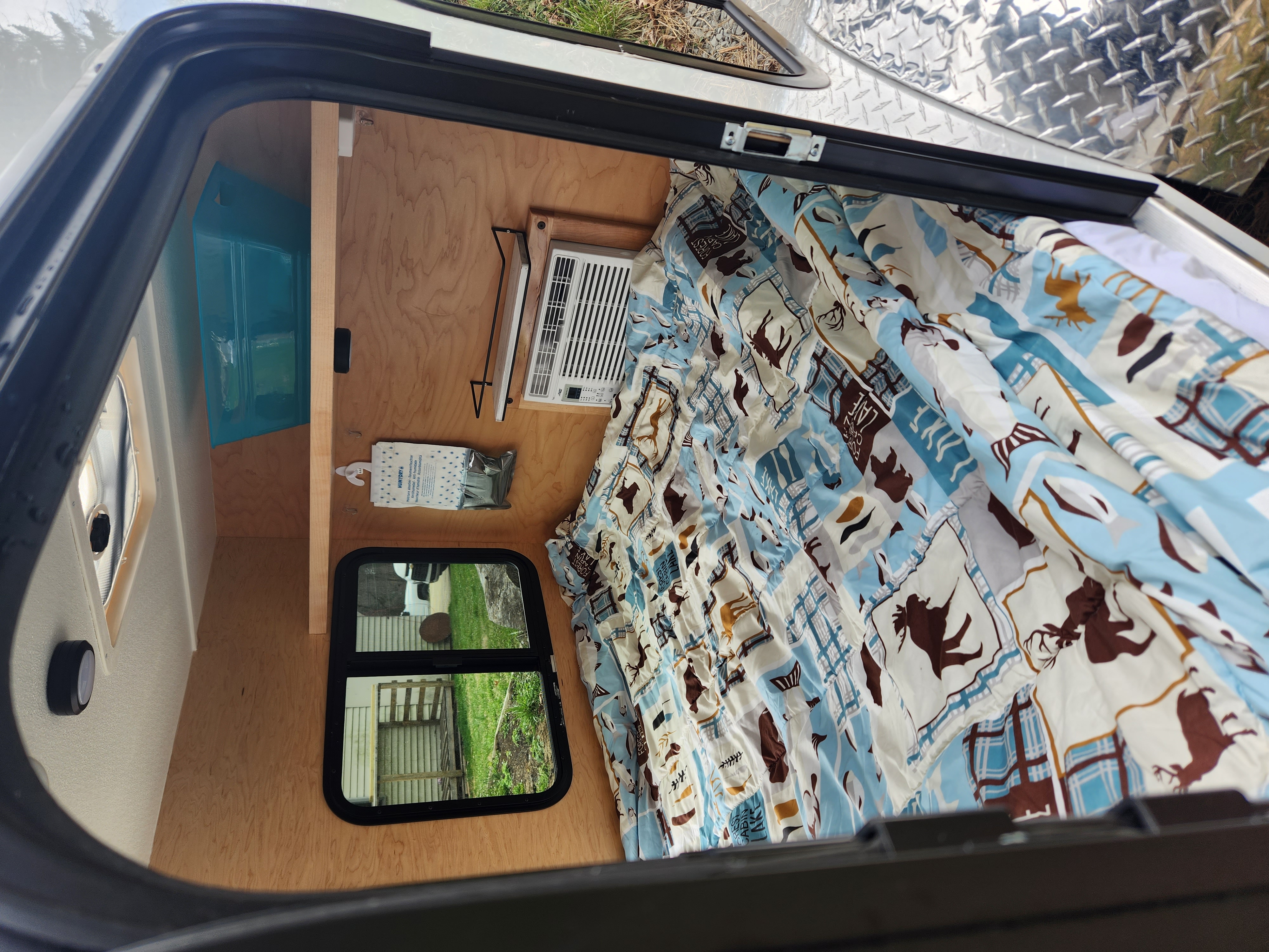 View from drivers side. New Wave Teardrop Camper 5x8 with Kitchen Galley 2022