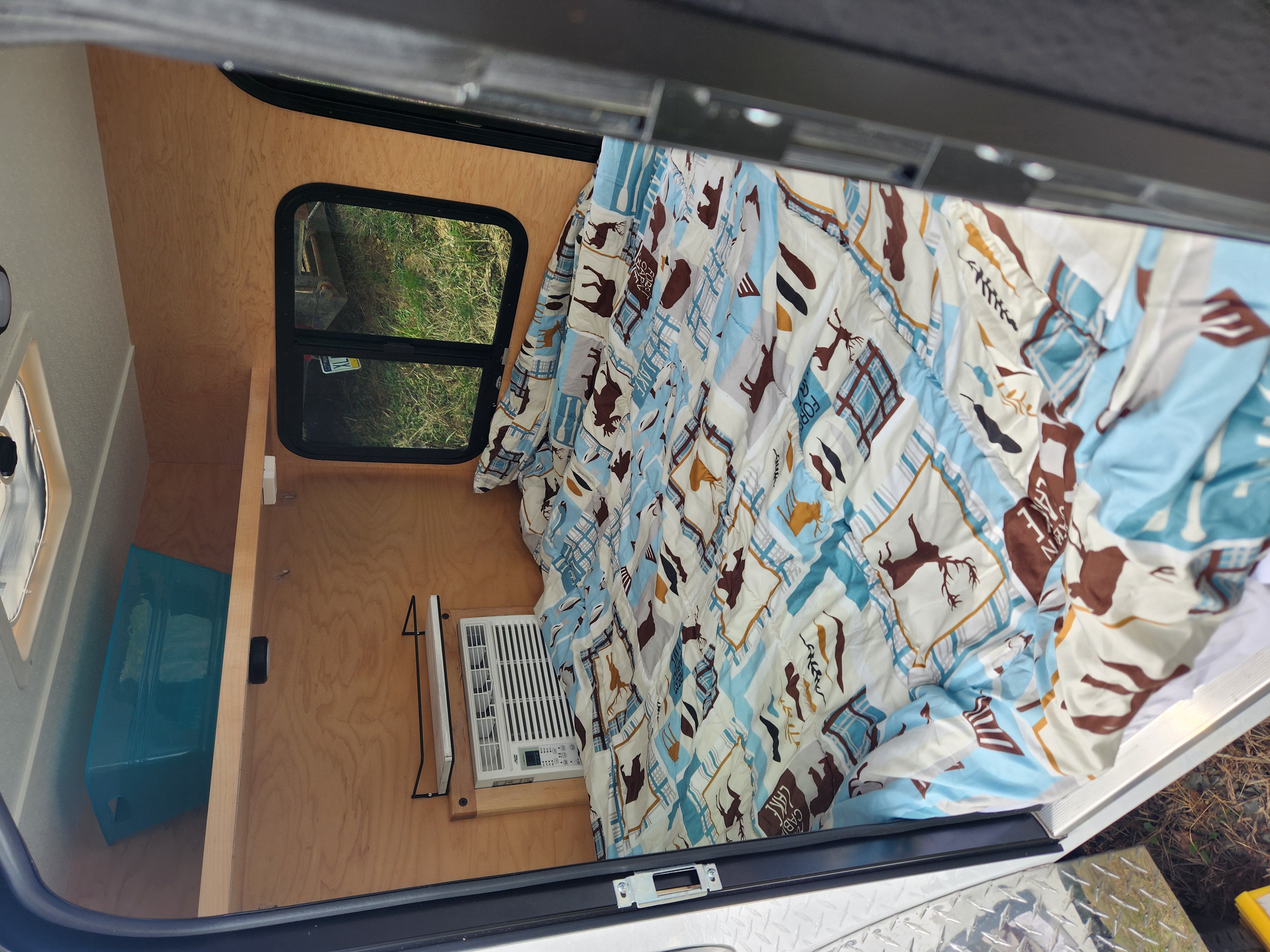 View from pasaenger side. New Wave Teardrop Camper 5x8 with Kitchen Galley 2022