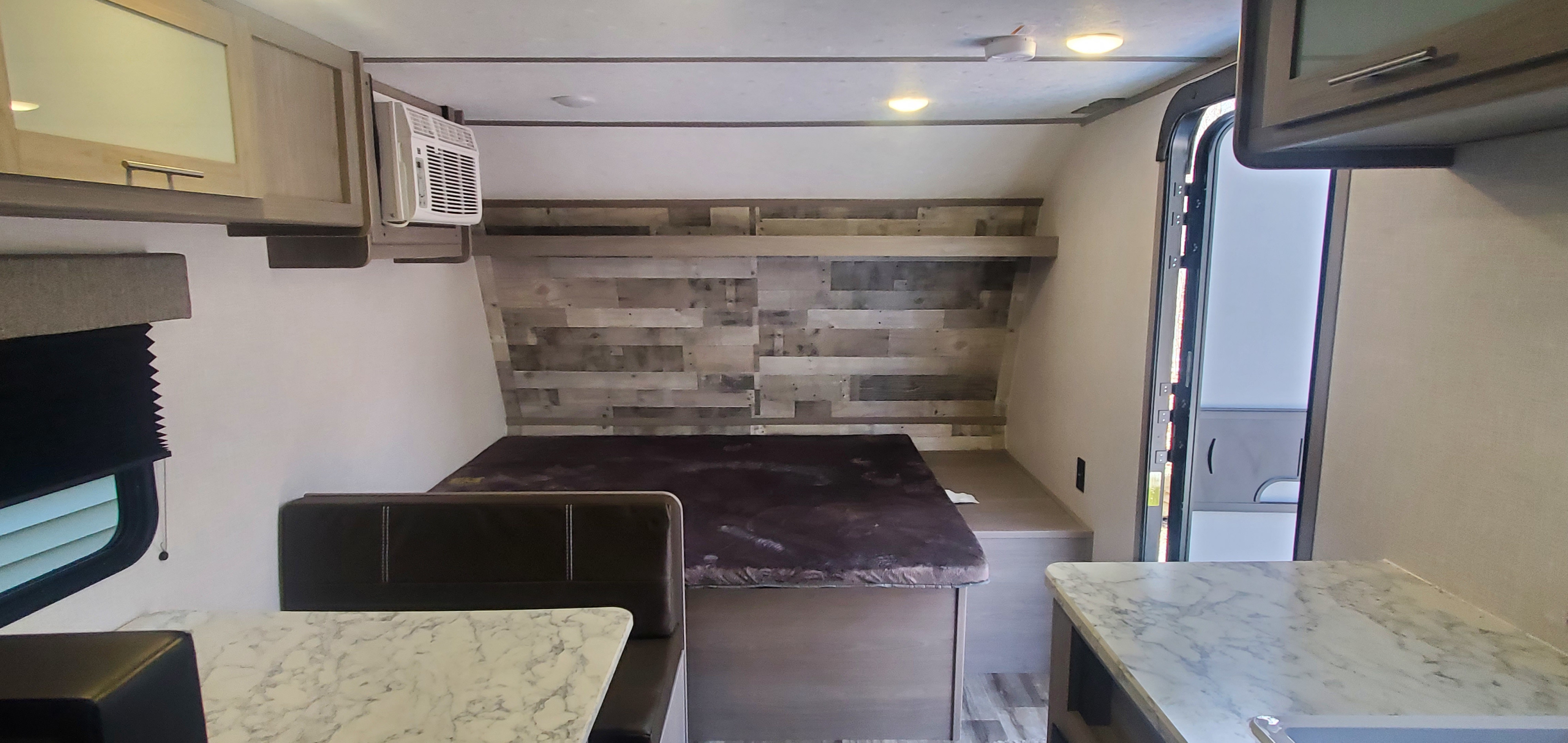 Queen Bed with AC overhead. Dutchmen Coleman Lantern LT 2023