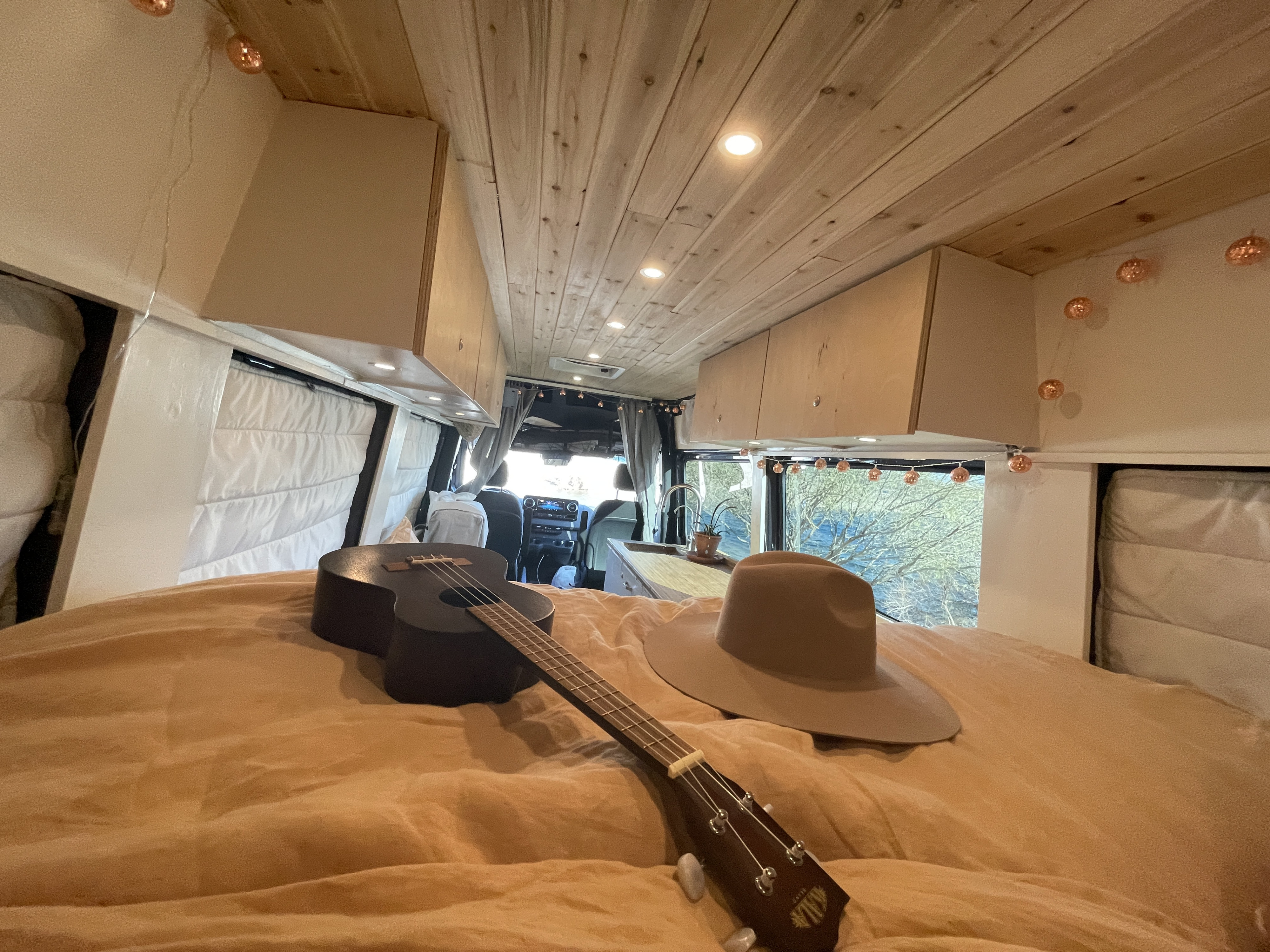 Plenty of headroom for sleeping on the Queen size bed. No cabinets above the bed to bump your head on. :). Mercedes-Benz Sprinter 2019