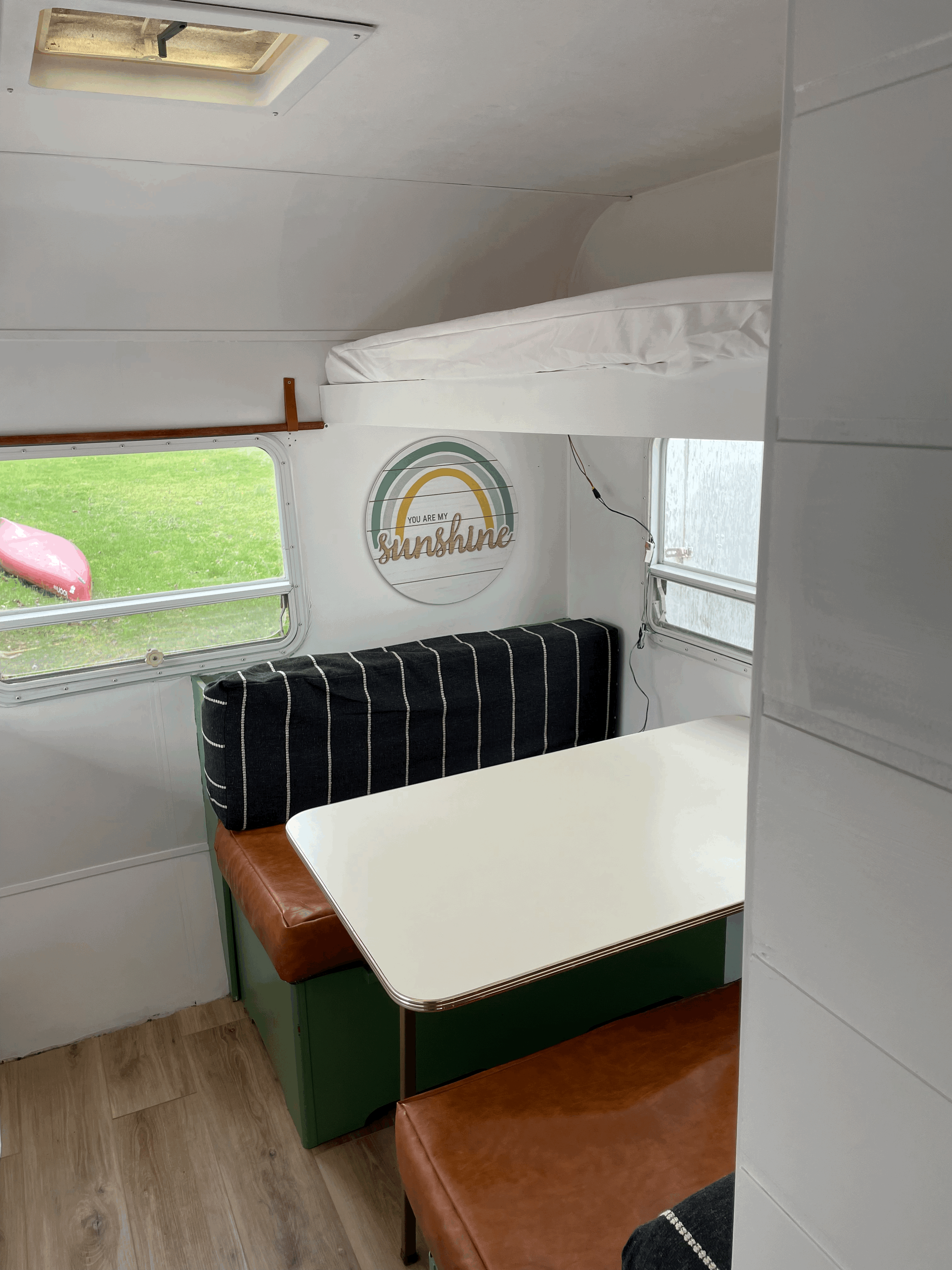 Back dining area + full size bed. Dutchmen Aerolite 1998