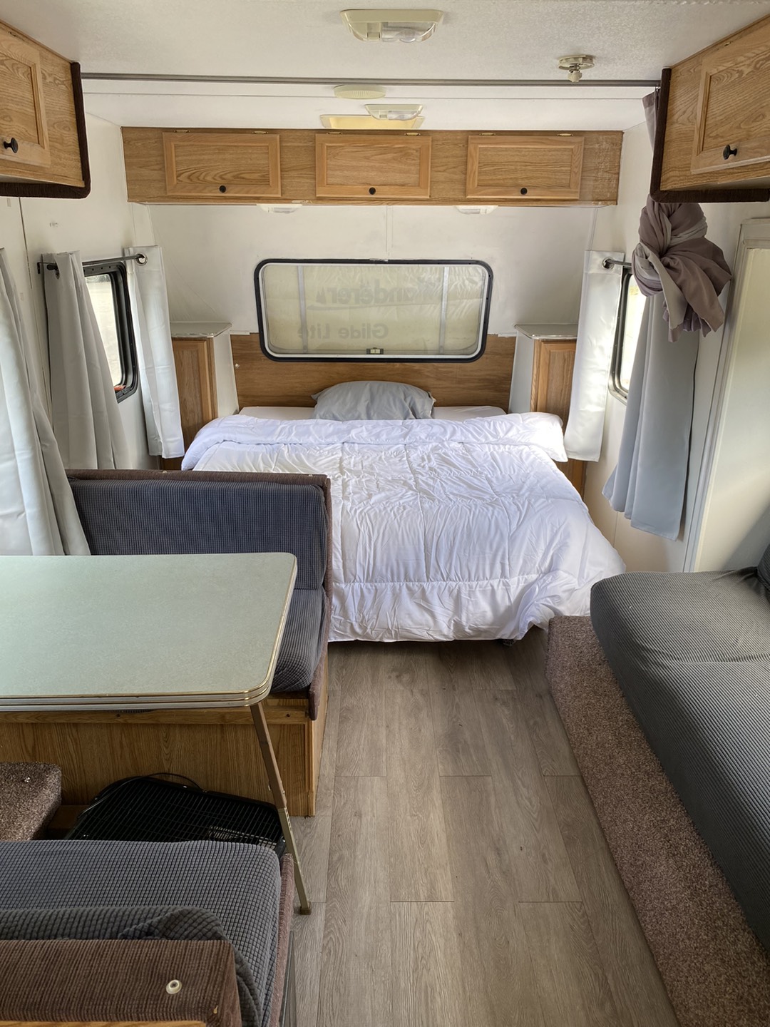 Queen size bed with Brand new mattress and storage under neither . Thor Wanderer Lite 2001